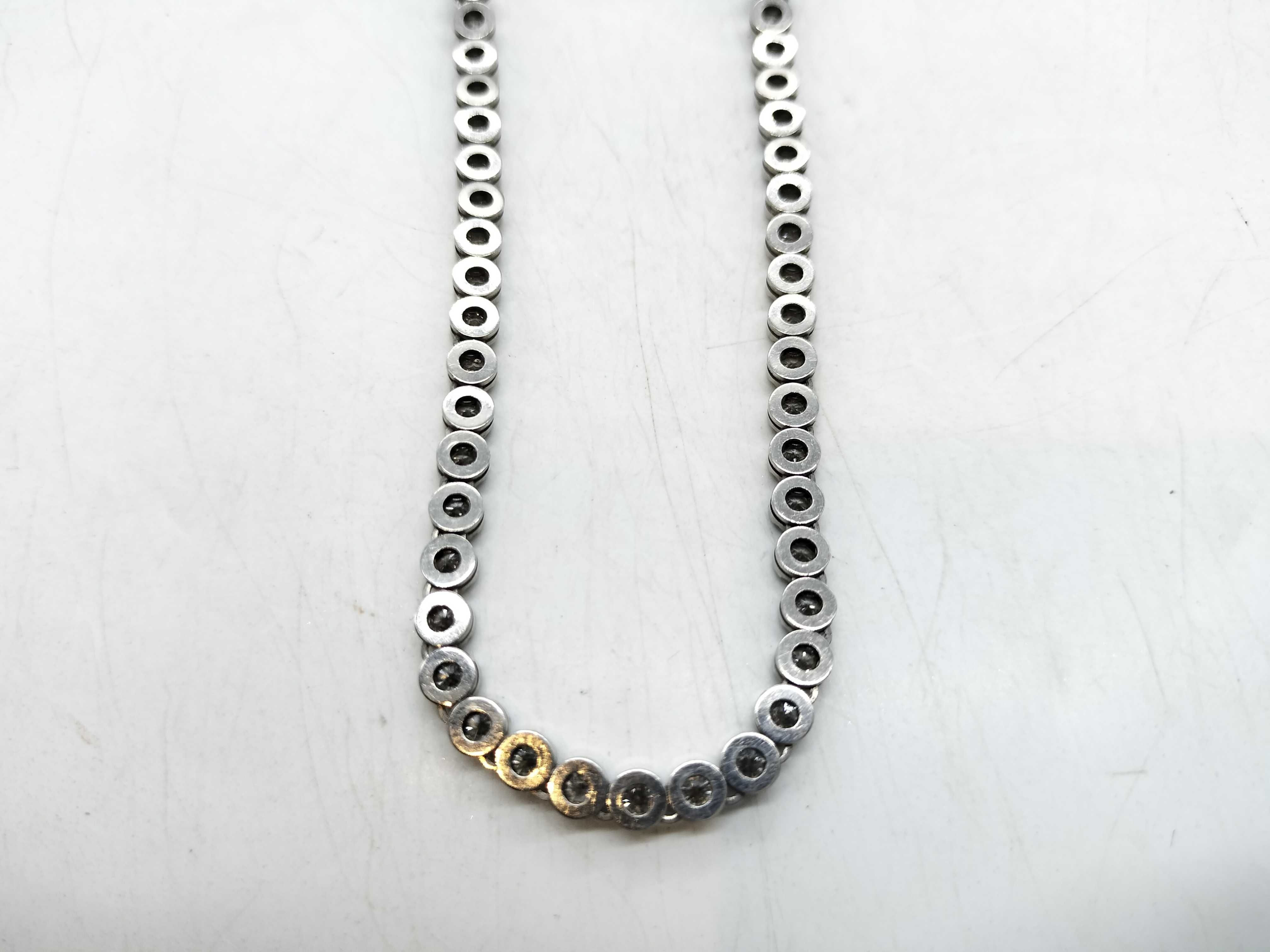 A Platinum and 10.00ctw Natural Diamond Graduated Tennis Necklace