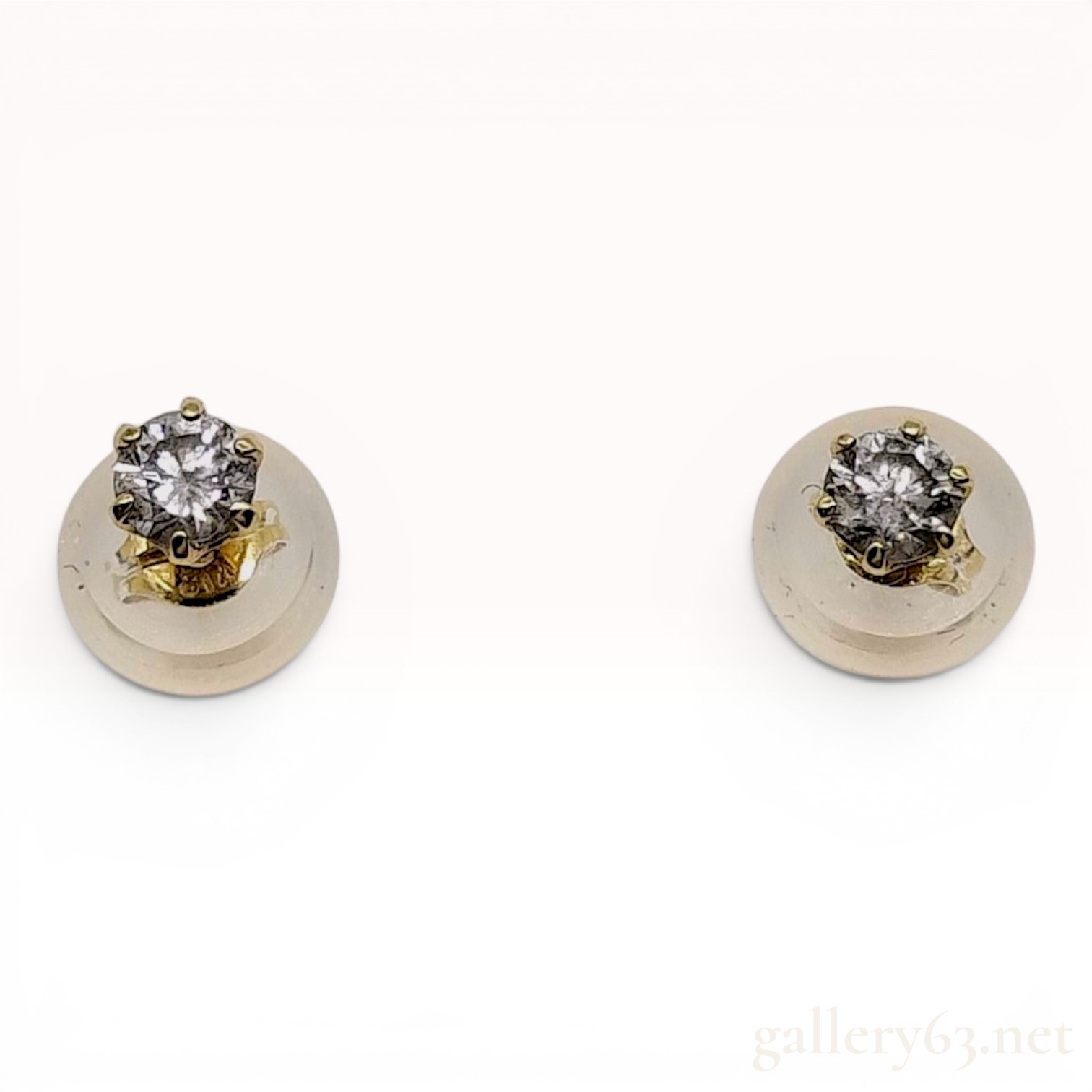 A Pair of Diamond and 18K Yellow Gold Stud Earrings