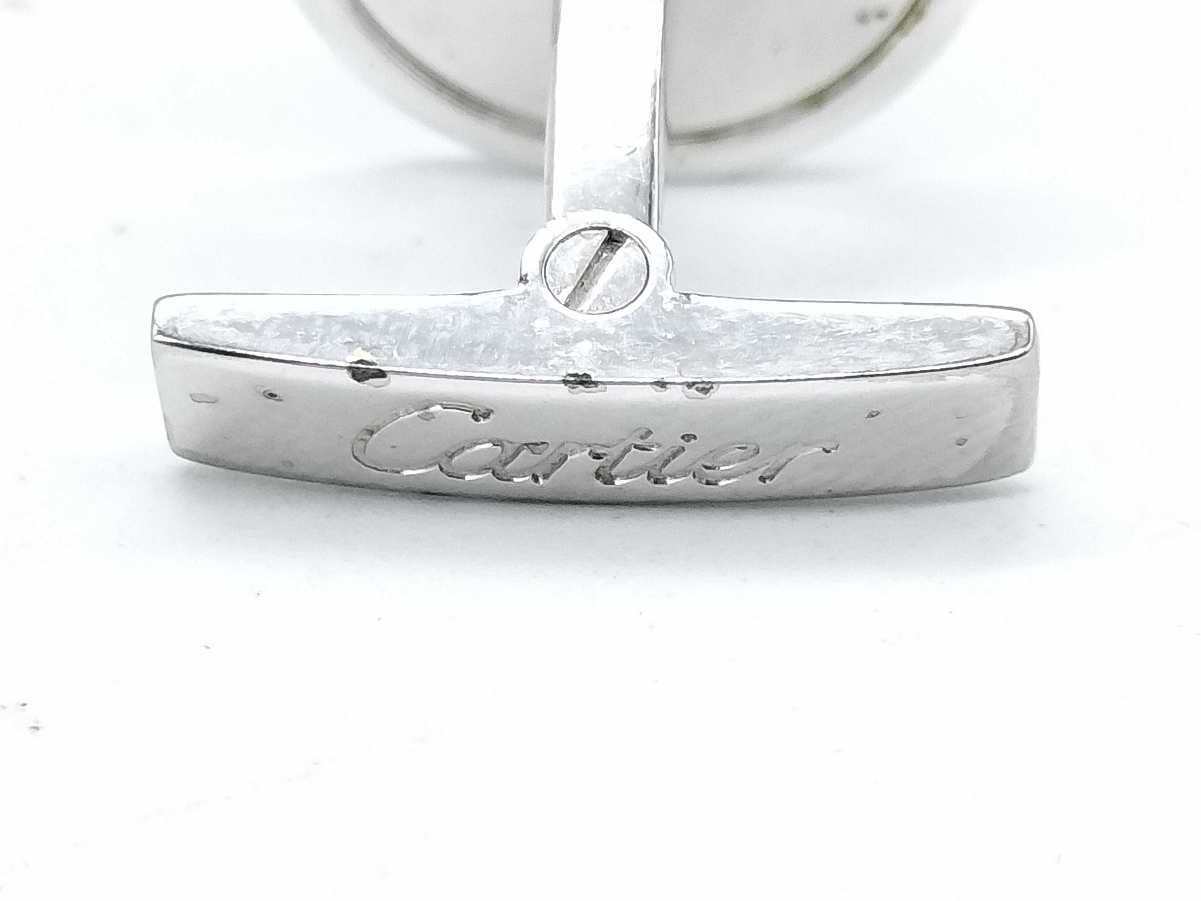 A Pair of Cartier Sterling Silver and Blue Topaz Round Cufflinks
