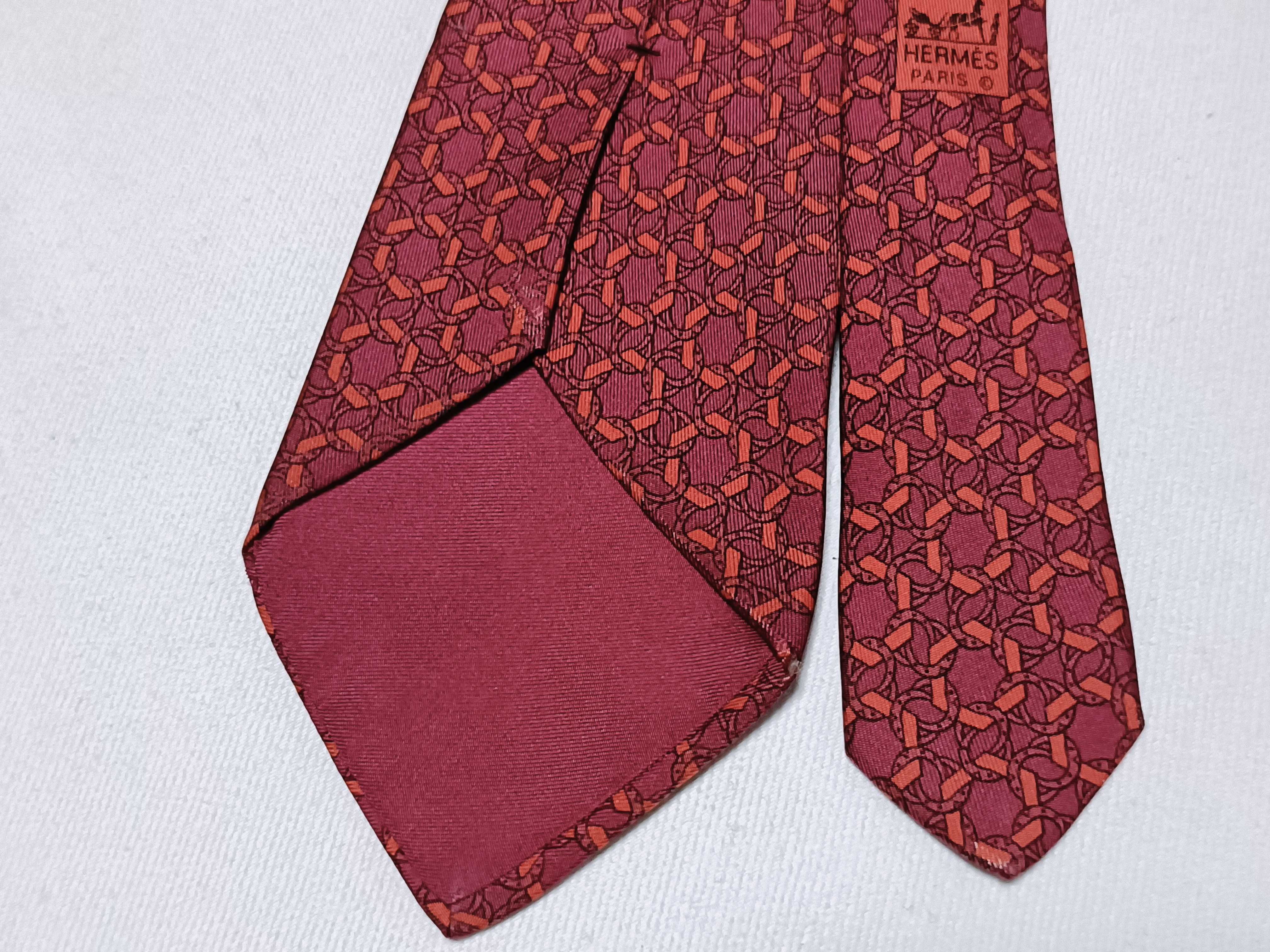 Hermes Burgundy and Orange Geometric Interlocking Link Pattern Silk Tie