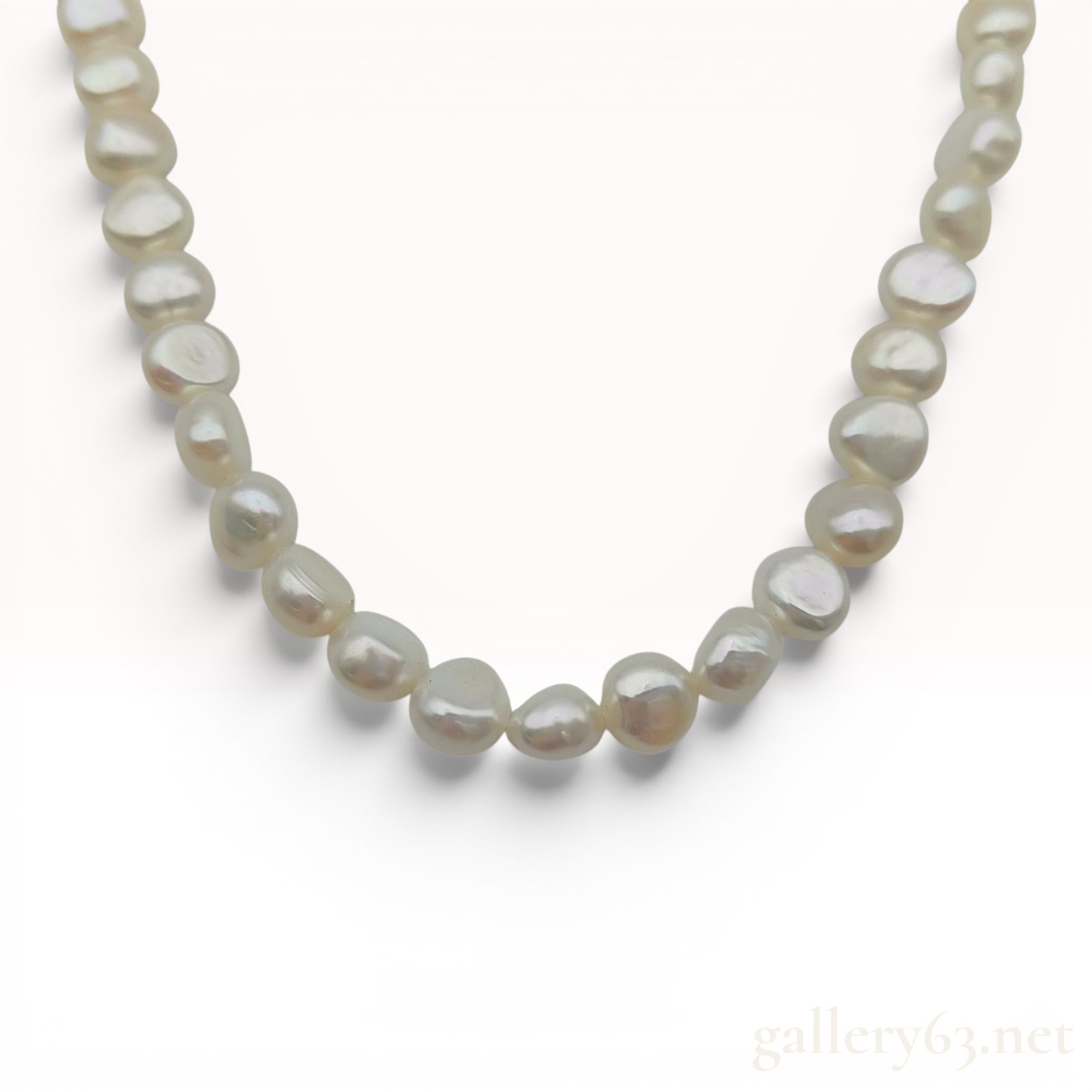 Cultured Baroque Pearl Necklace with Silver Floral Motif Clasp