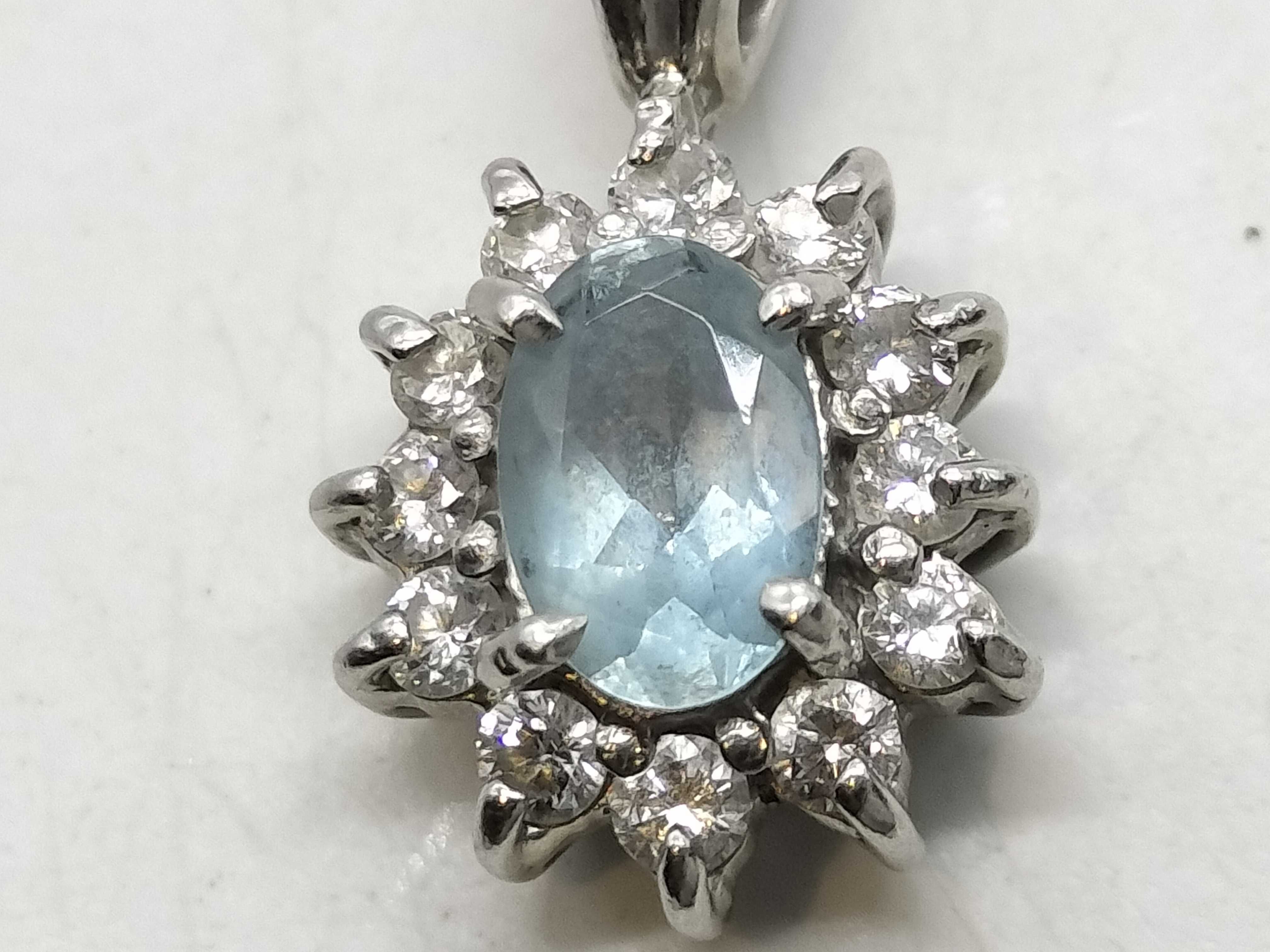Platinum Oval Aquamarine and Diamond Halo Pendant