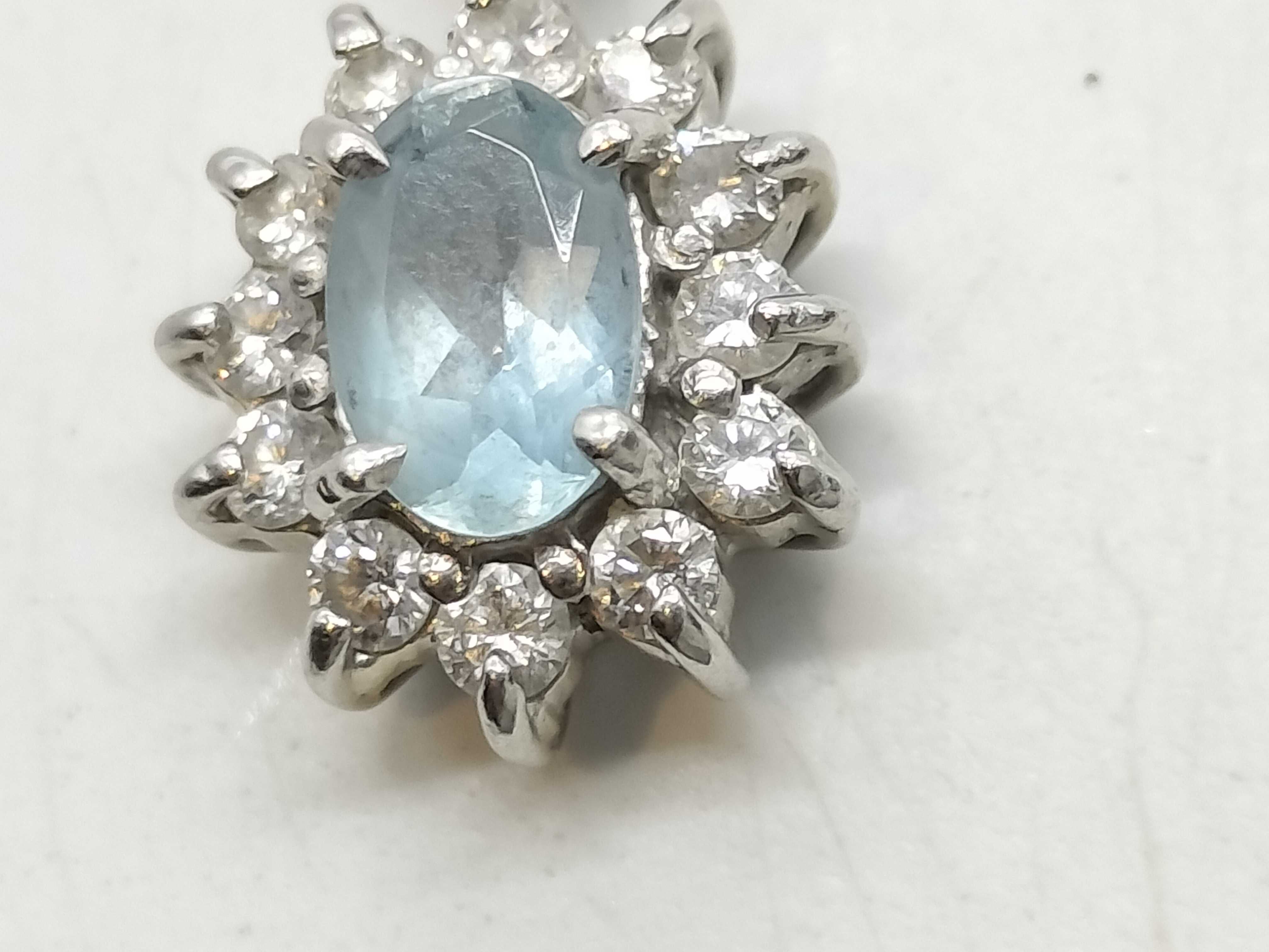 Platinum Oval Aquamarine and Diamond Halo Pendant