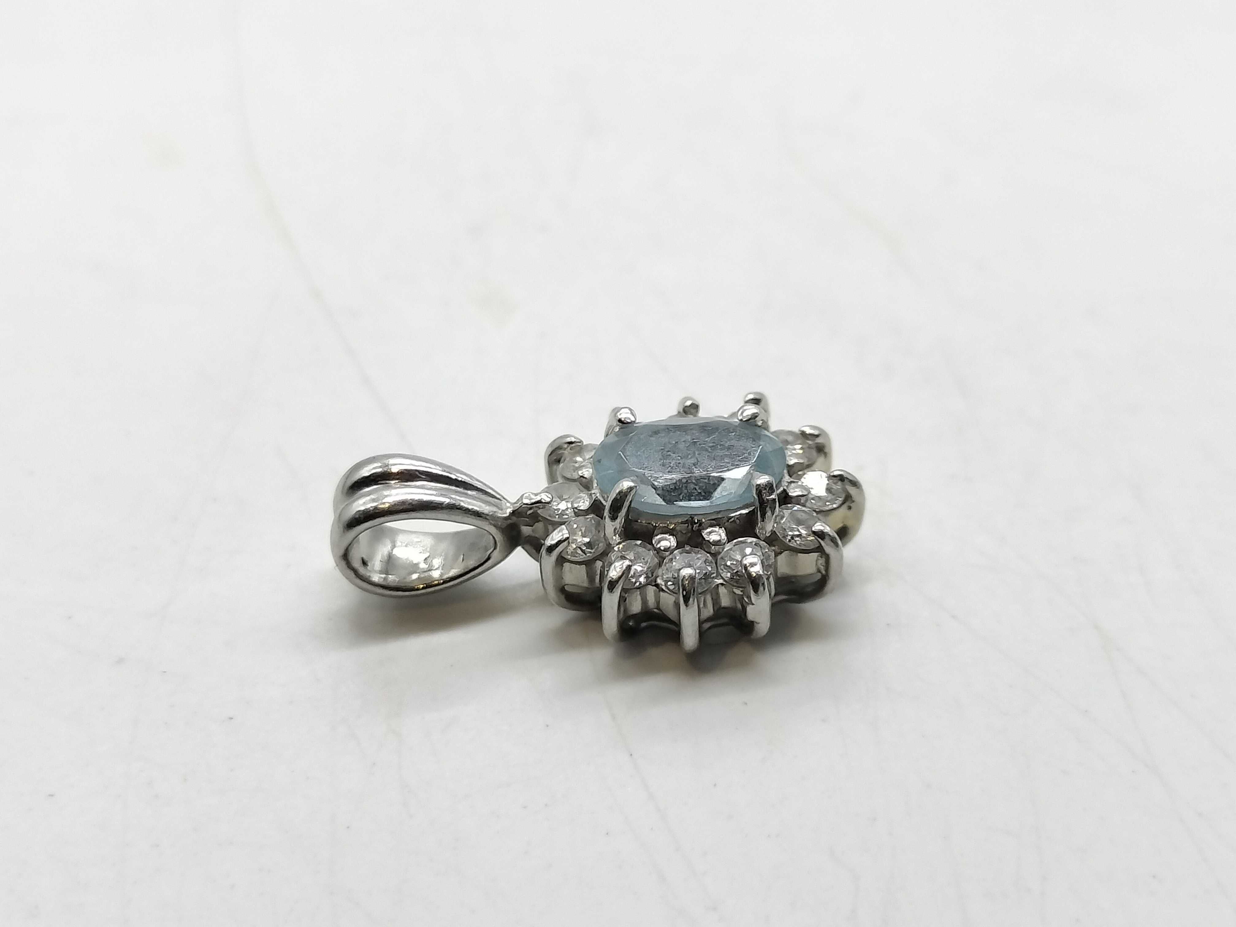 Platinum Oval Aquamarine and Diamond Halo Pendant