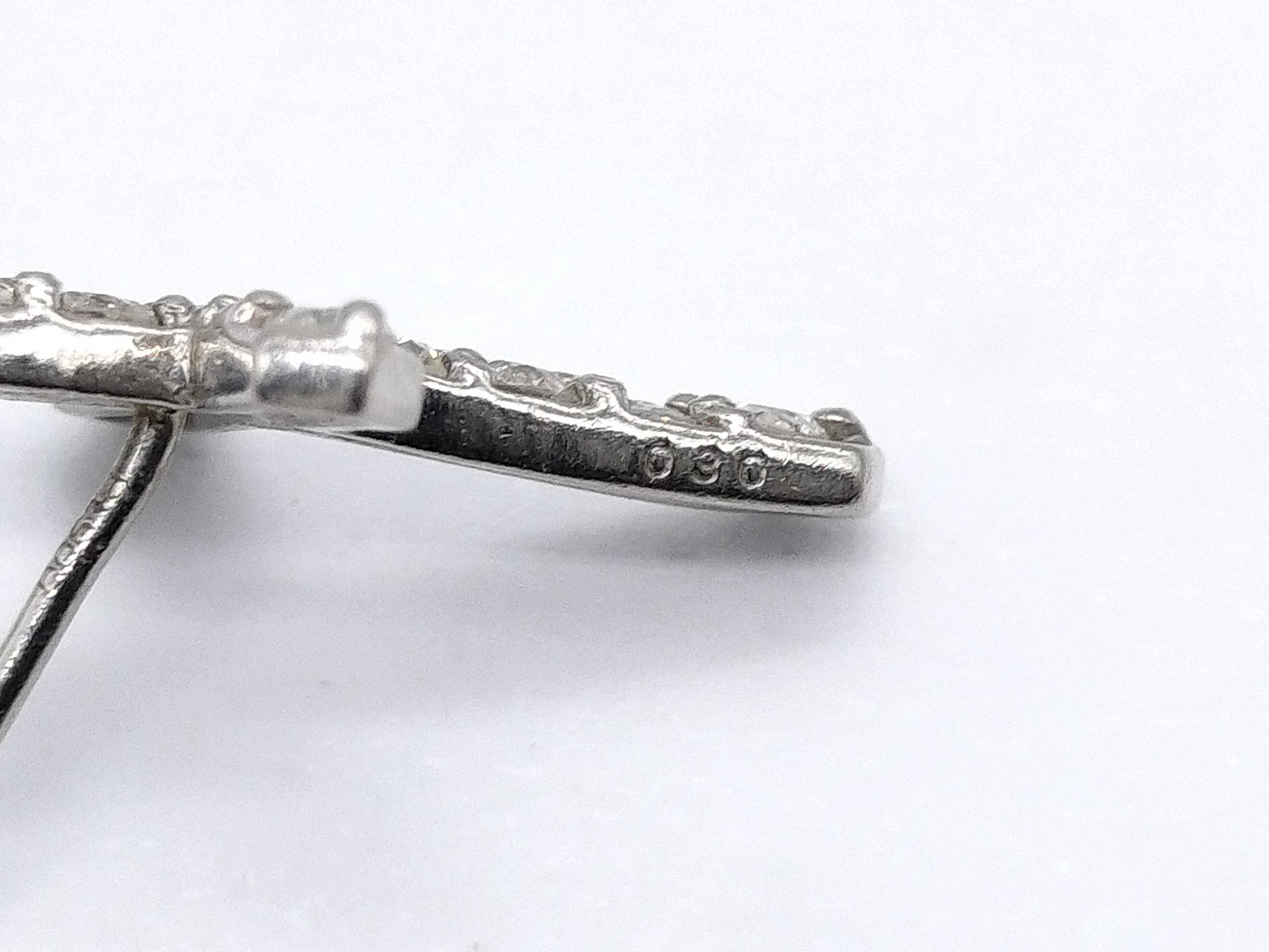 A Single Platinum and Diamond Cross Stud Earring