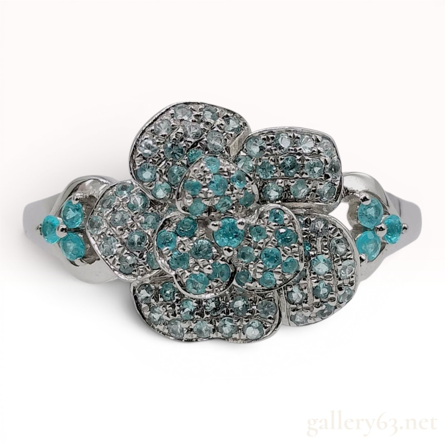 A Platinum and Paraiba Tourmaline Flower Cluster Ring