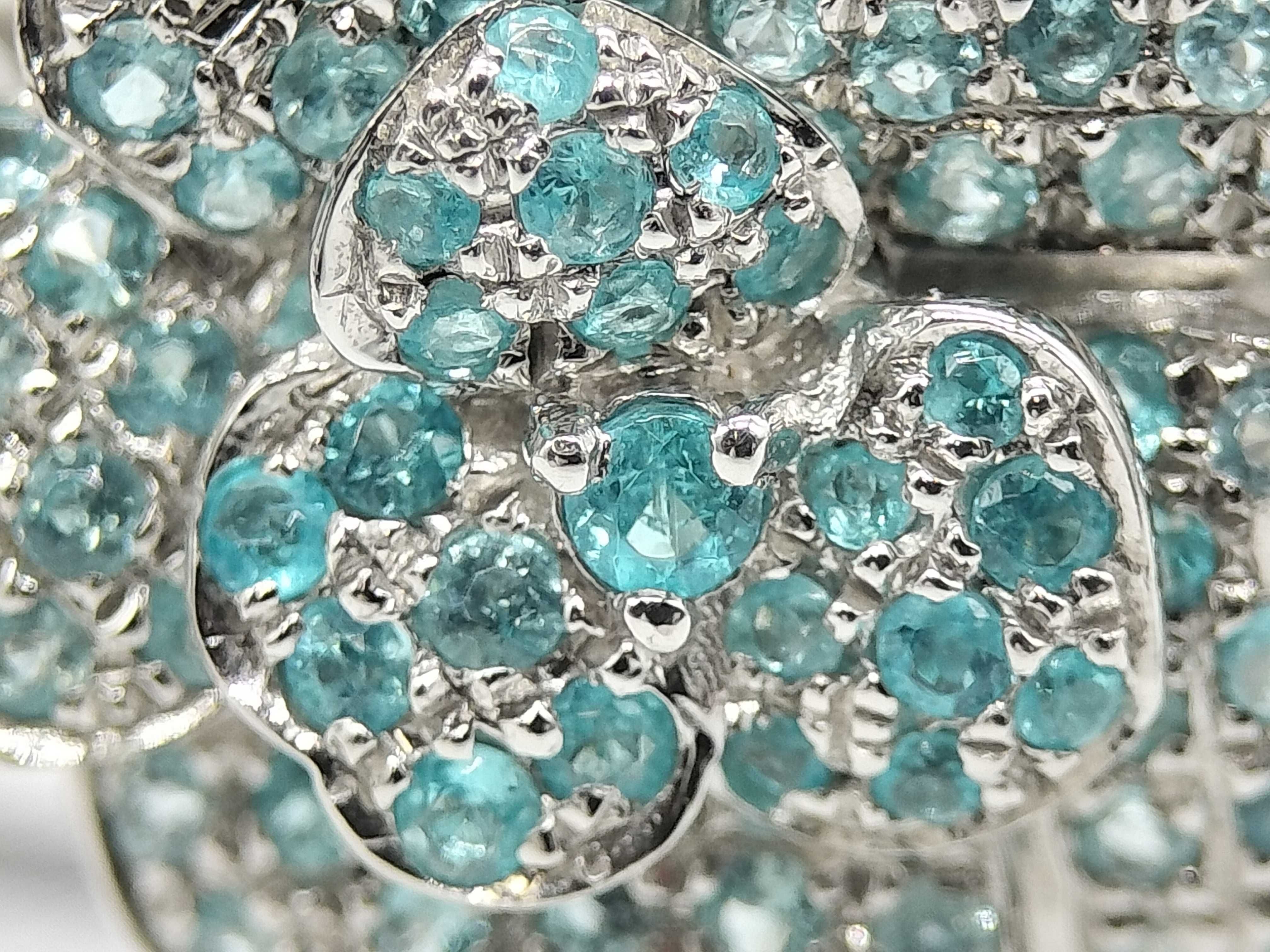 A Platinum and Paraiba Tourmaline Flower Cluster Ring