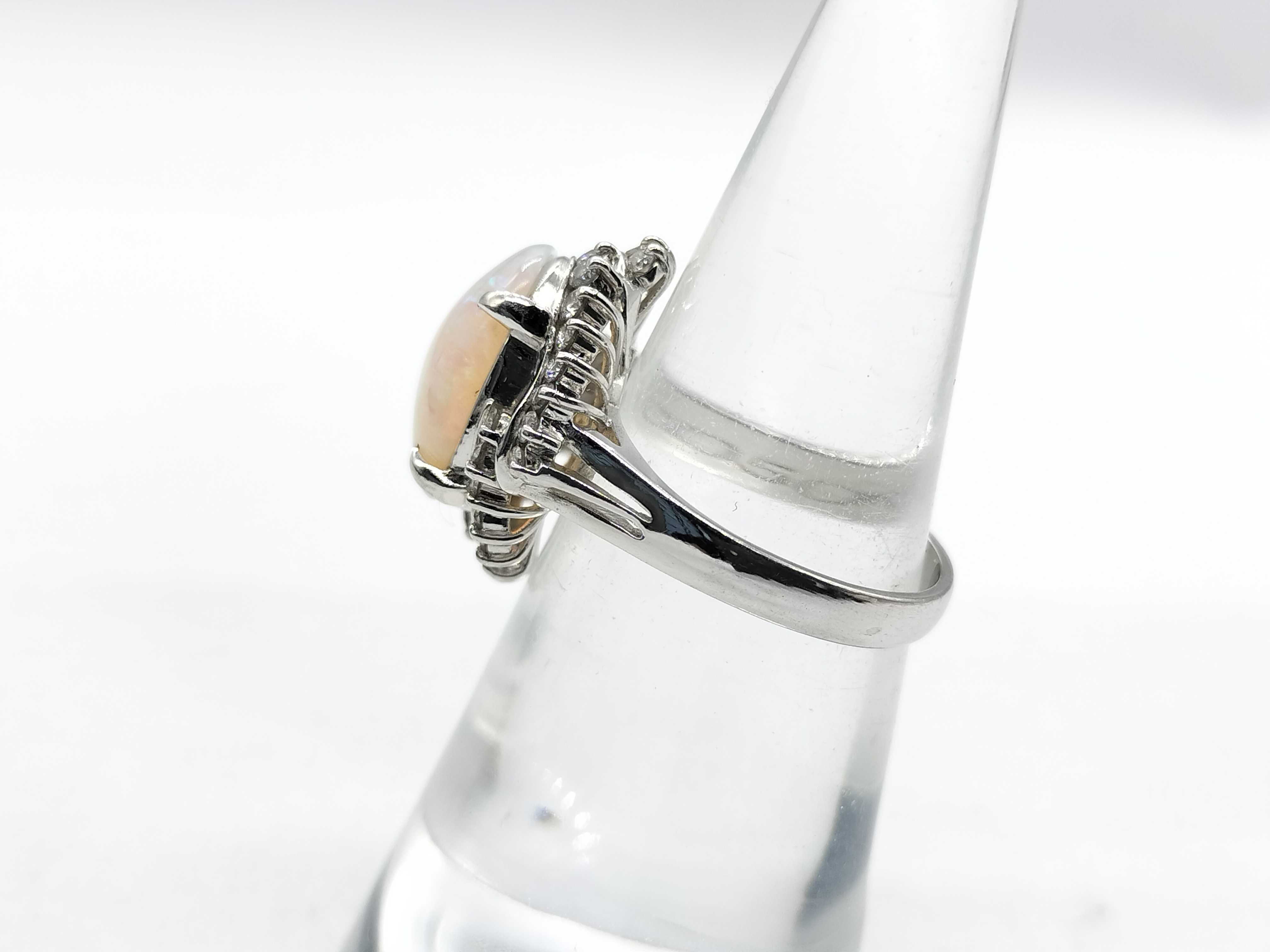 A 2.41ct Australian Opal and .50ctw Diamond Halo Cocktail Ring in Platinum