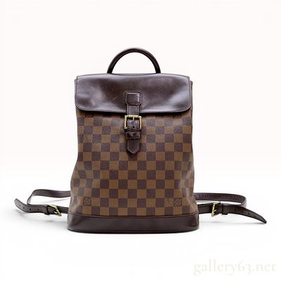 Louis Vuitton Damier Ebene Soho Backpack. A Louis Vuitton Soho backpack constructed of Damier 