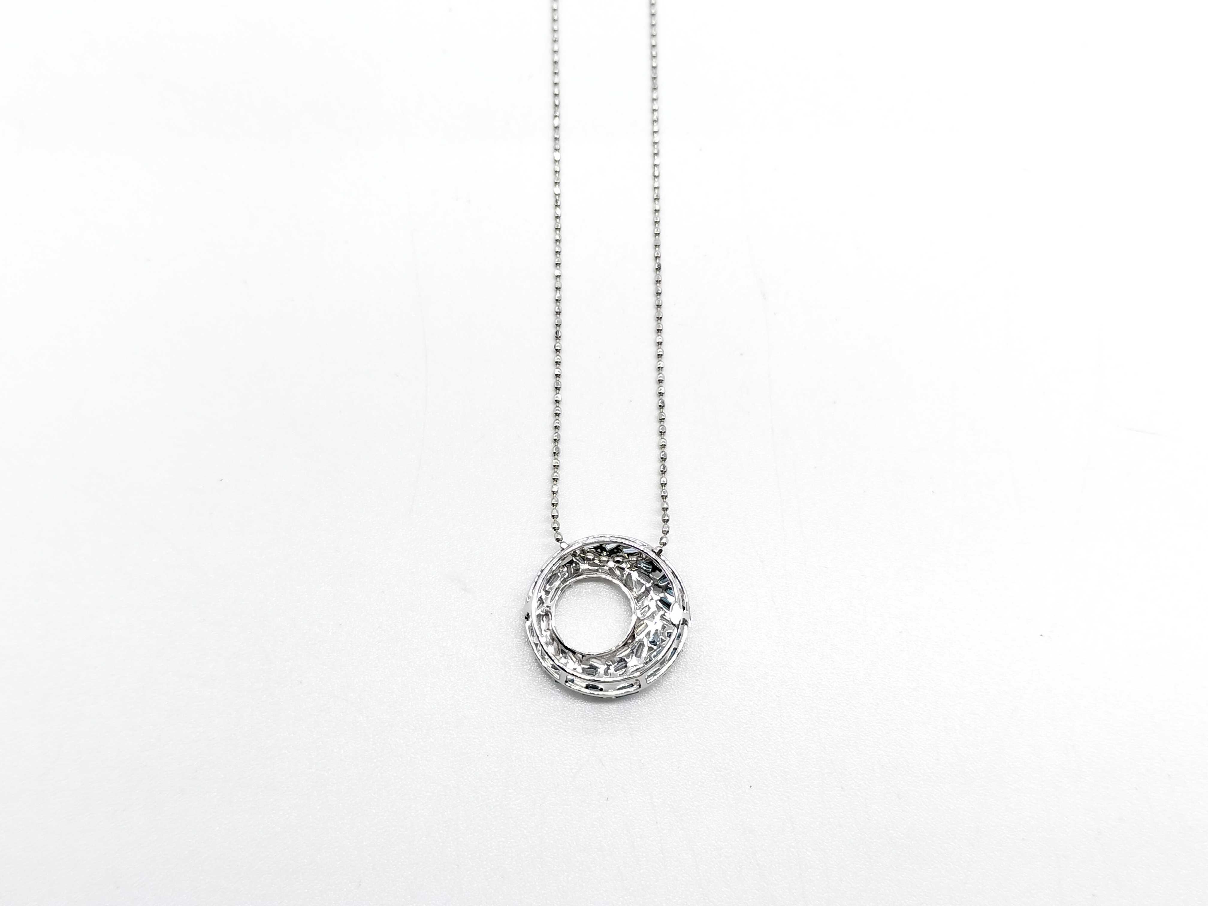 An 18 Karat White Gold 0.40 Carat Sapphire and Diamond Ombre Circle Pendant Necklace