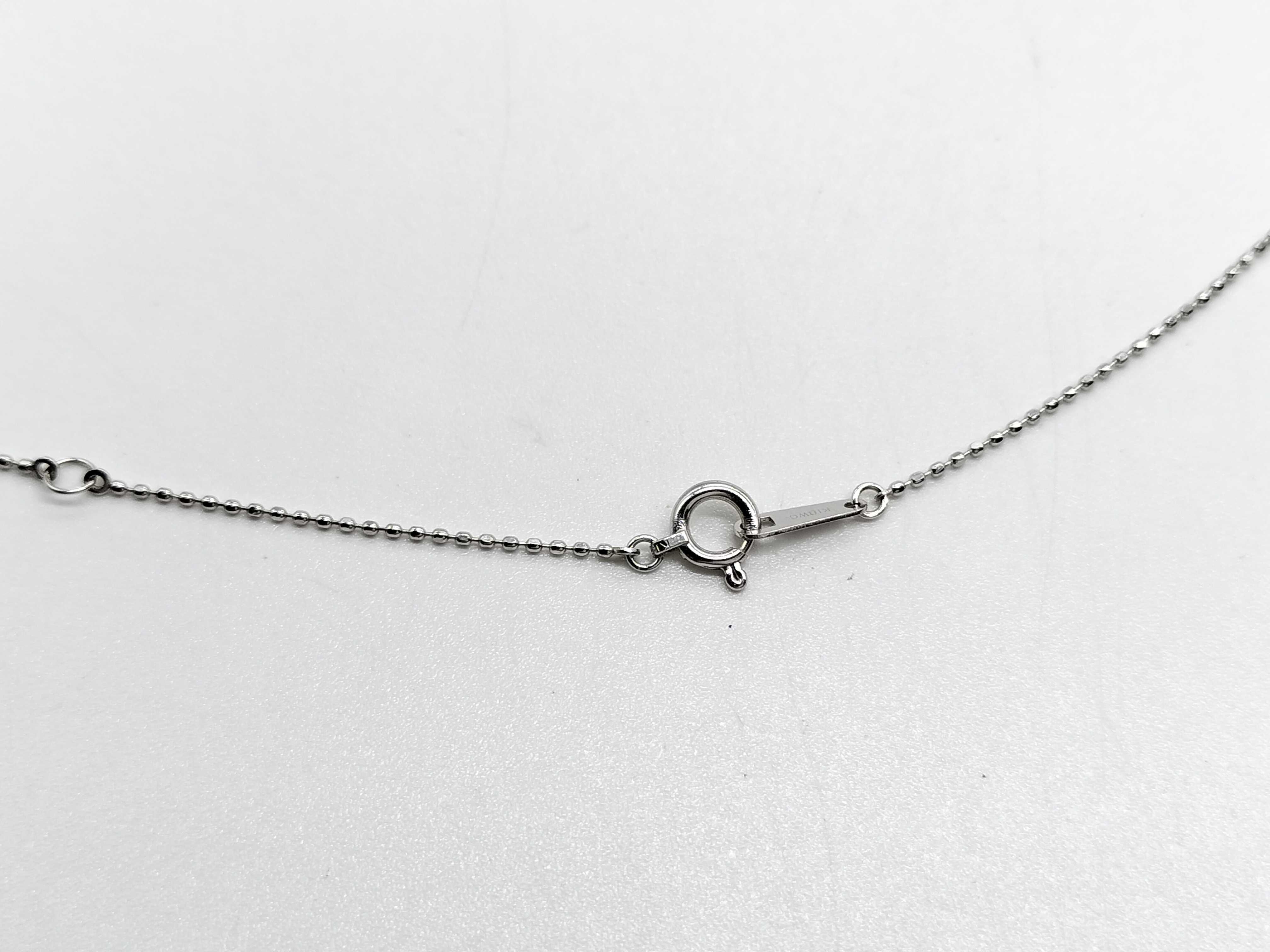 An 18 Karat White Gold 0.40 Carat Sapphire and Diamond Ombre Circle Pendant Necklace