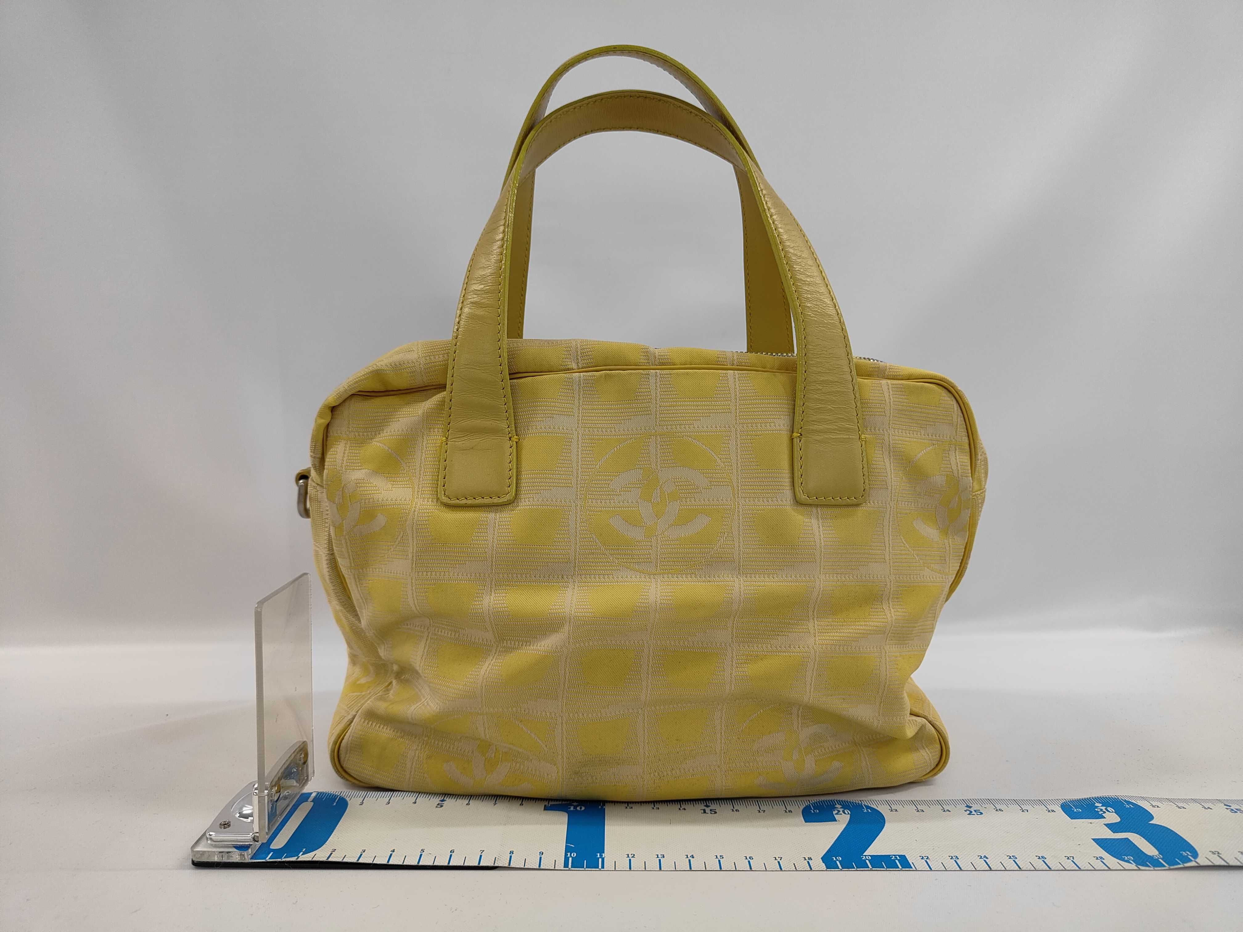 A Chanel New Travel Line Yellow Jacquard Handbag with Detachable Shoulder Strap
