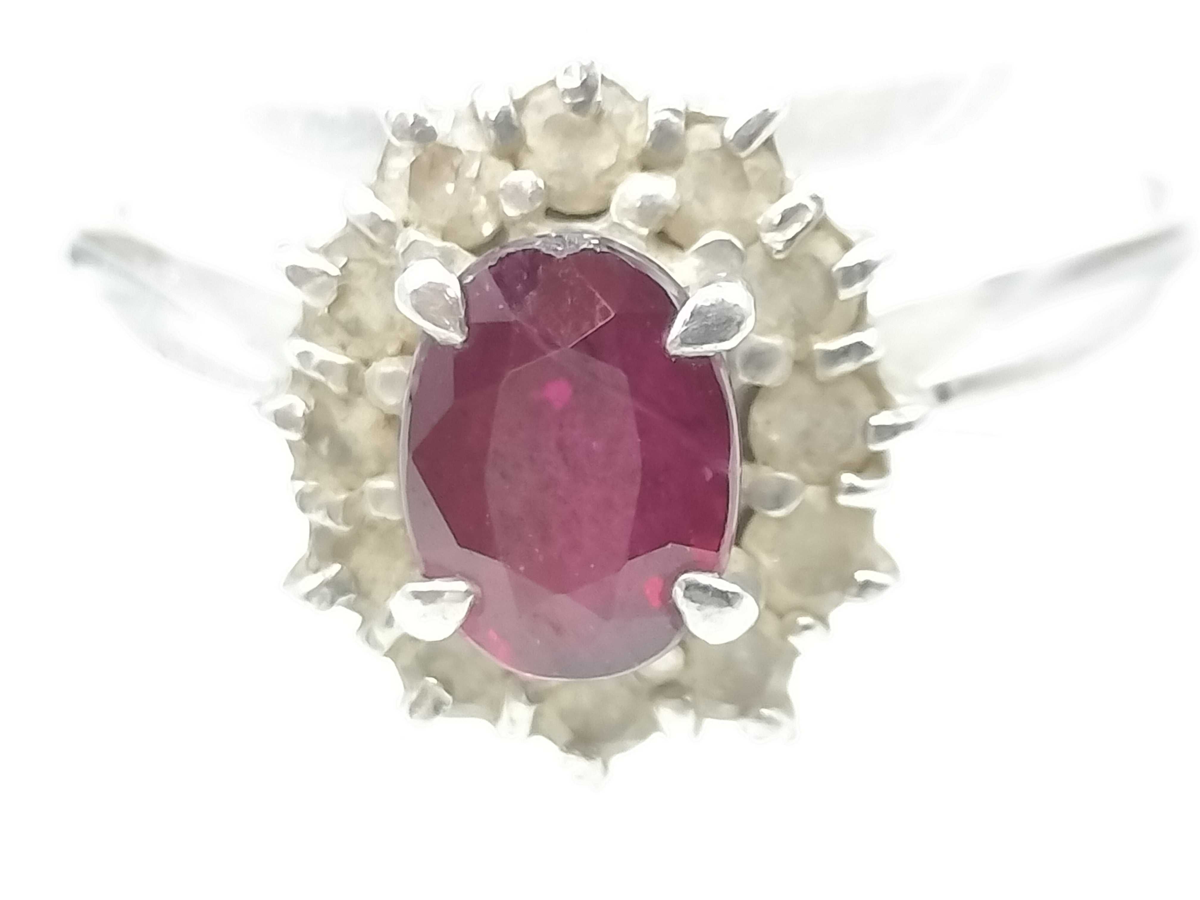 A Platinum Ruby and Diamond Halo Cluster Ring