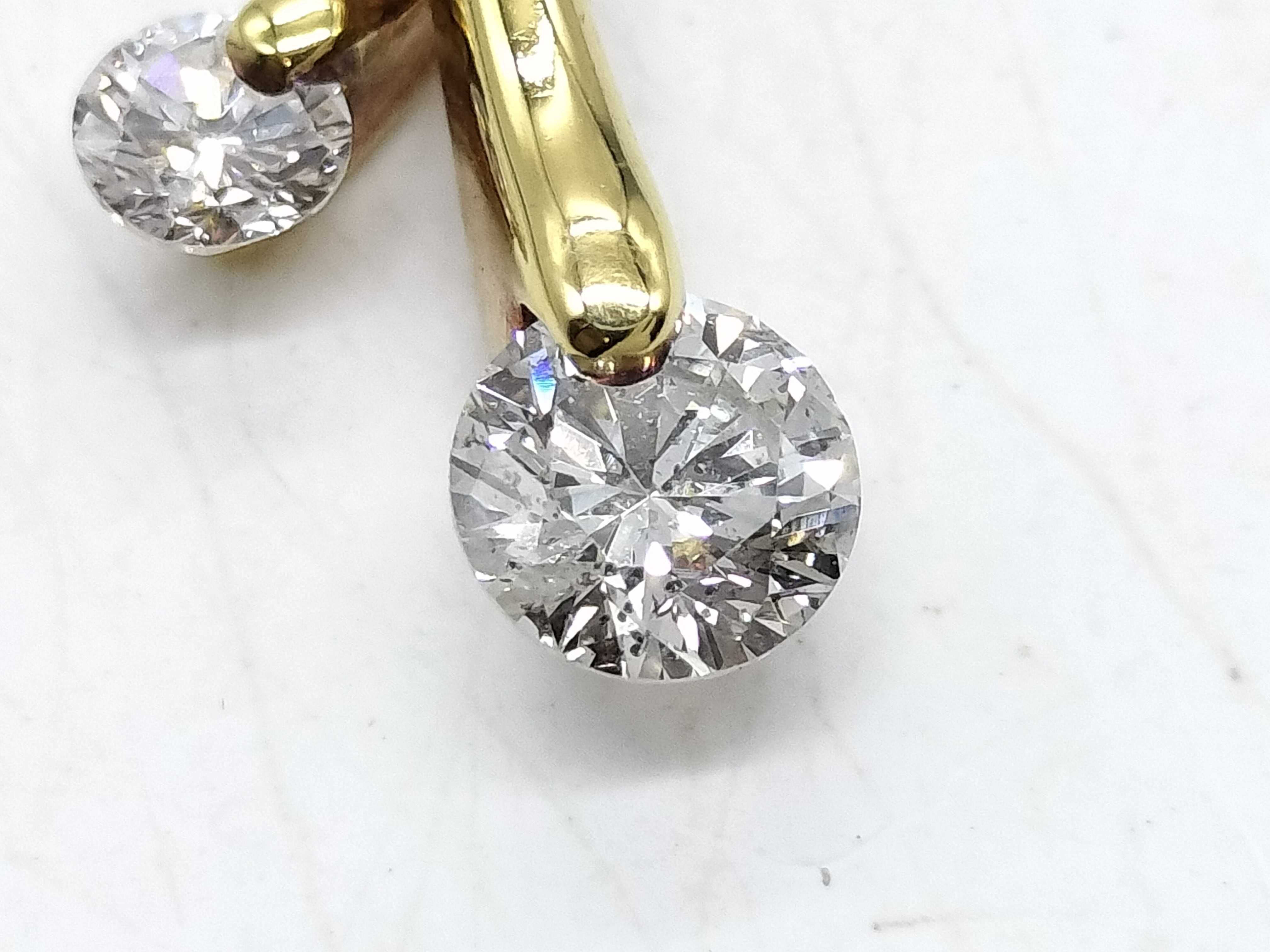 An 18 Karat Yellow Gold and Two-Stone Diamond Bypass Pendant