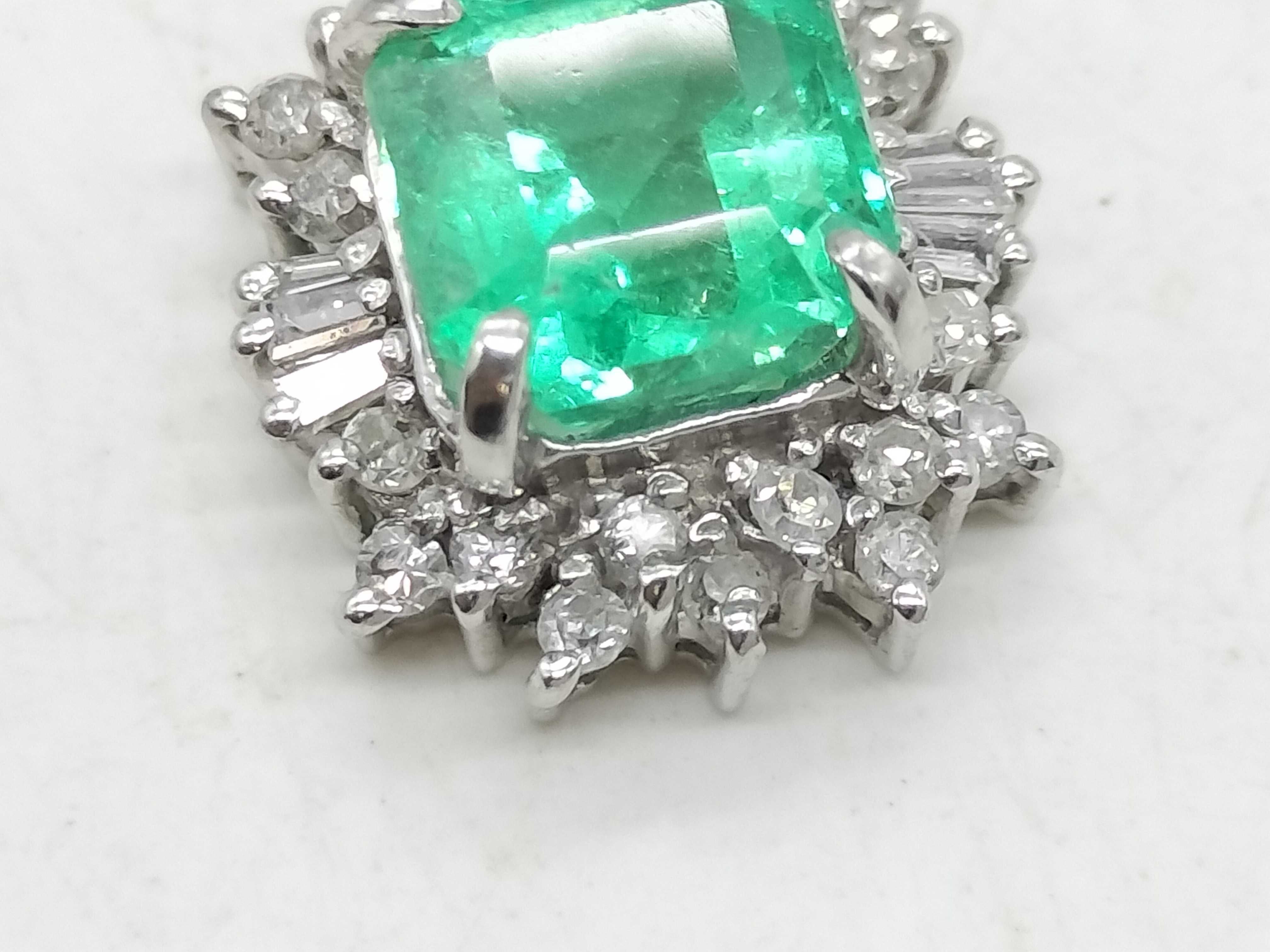 Platinum 1.22ct Emerald and .20ctw Diamond Halo Pendant