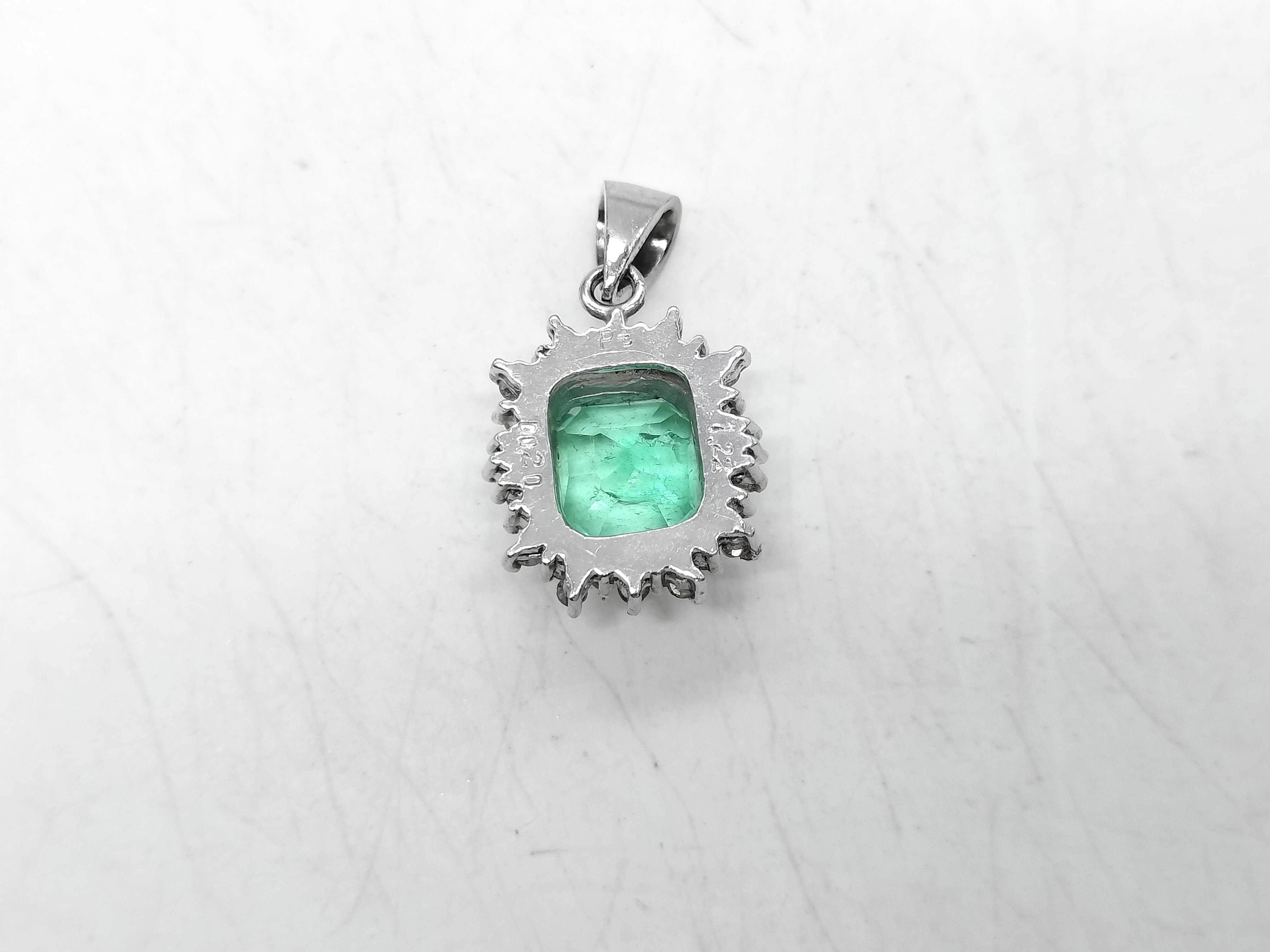 Platinum 1.22ct Emerald and .20ctw Diamond Halo Pendant