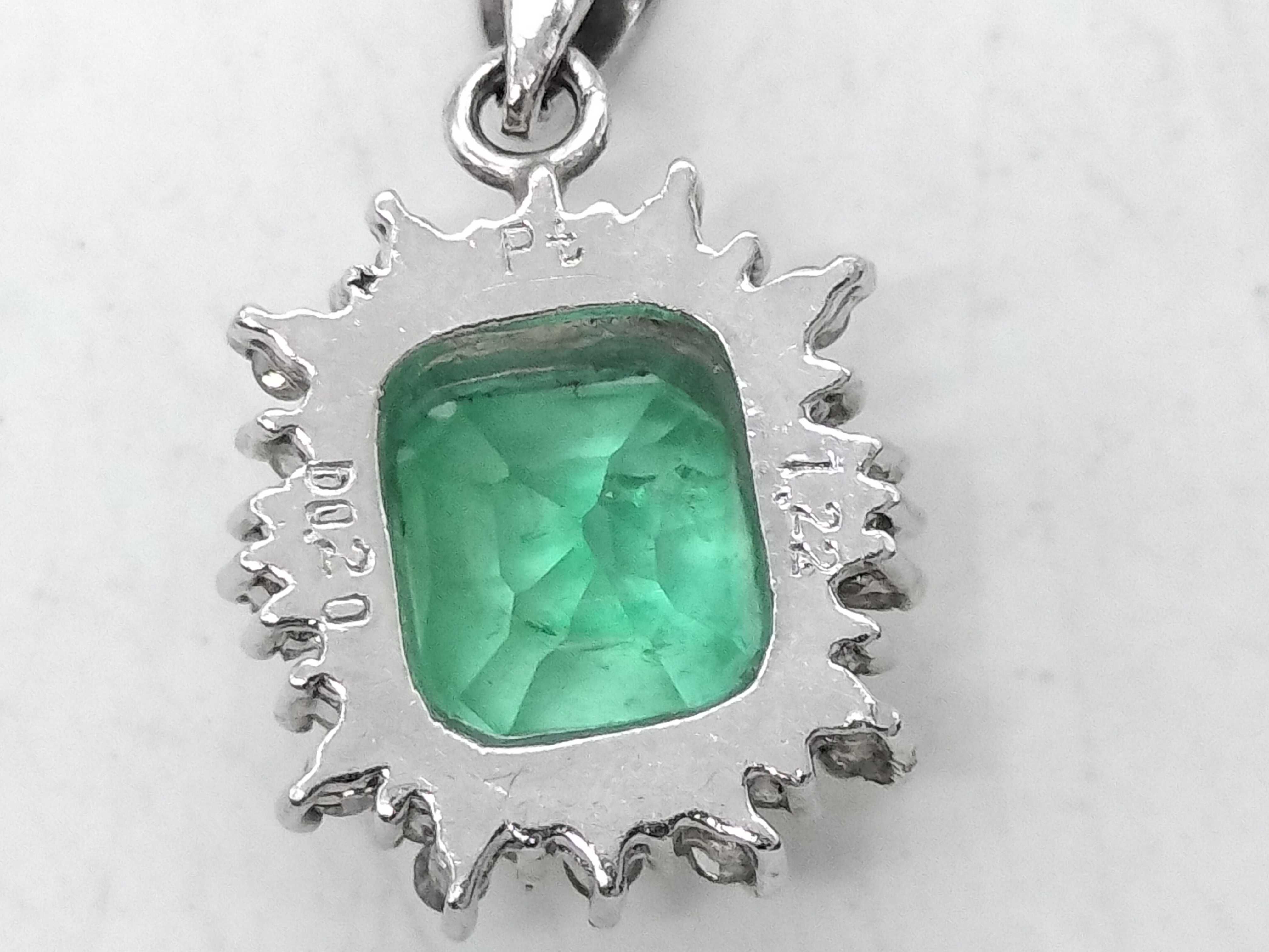 Platinum 1.22ct Emerald and .20ctw Diamond Halo Pendant