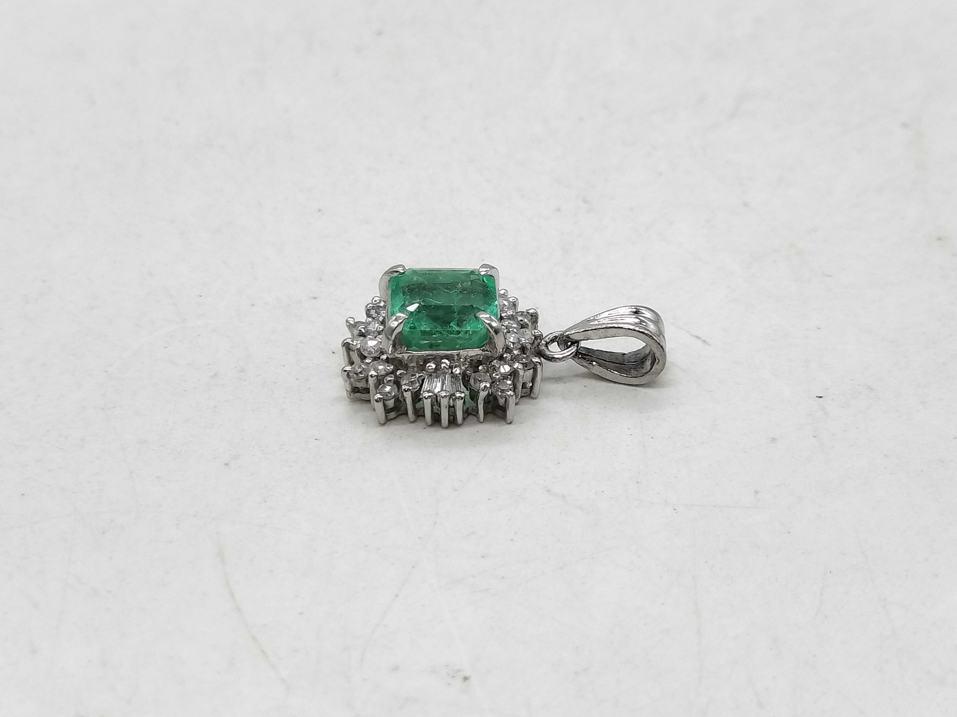 Platinum 1.22ct Emerald and .20ctw Diamond Halo Pendant