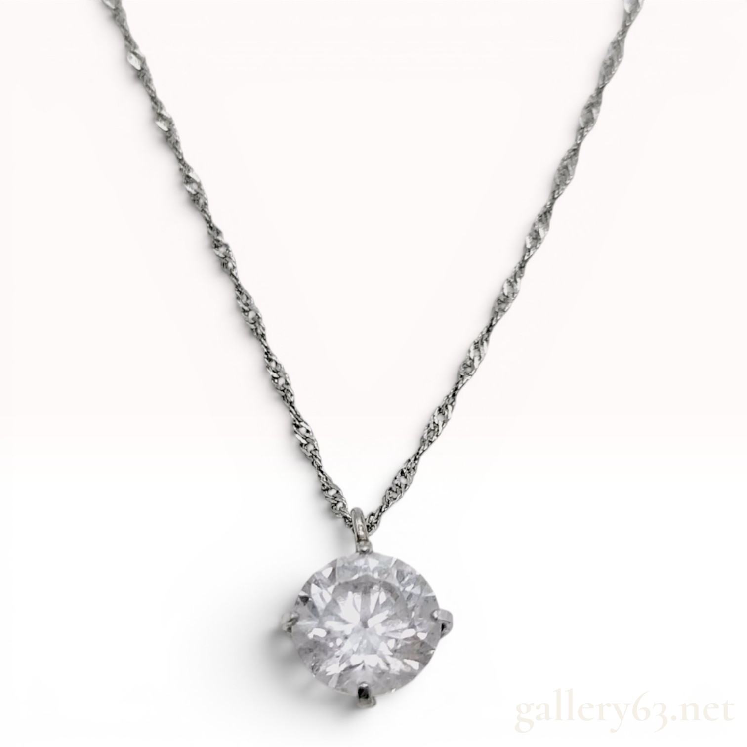 Platinum Solitaire Pendant Necklace with a 0.7 Carat Round Brilliant Cut Diamond