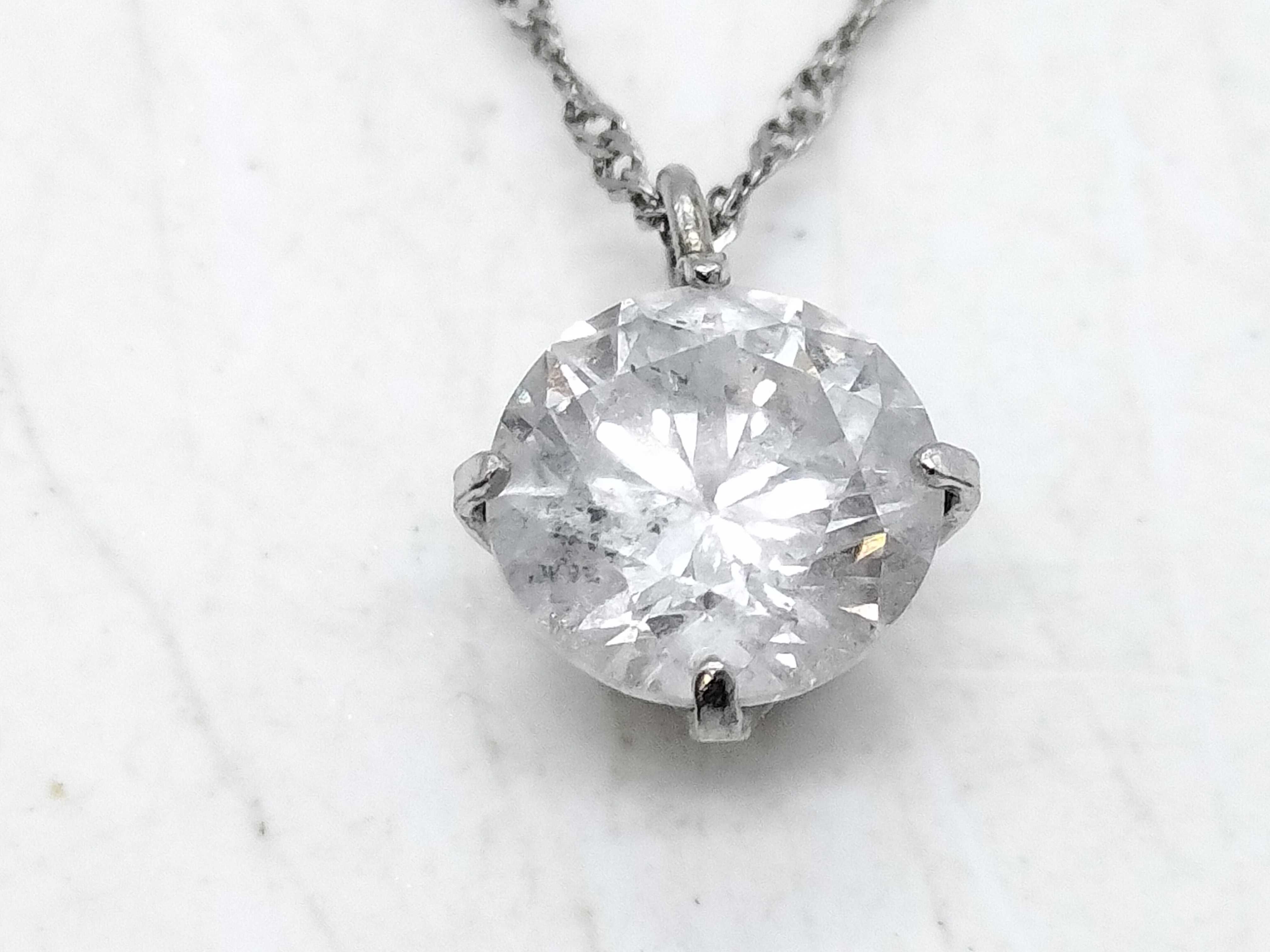 Platinum Solitaire Pendant Necklace with a 0.7 Carat Round Brilliant Cut Diamond