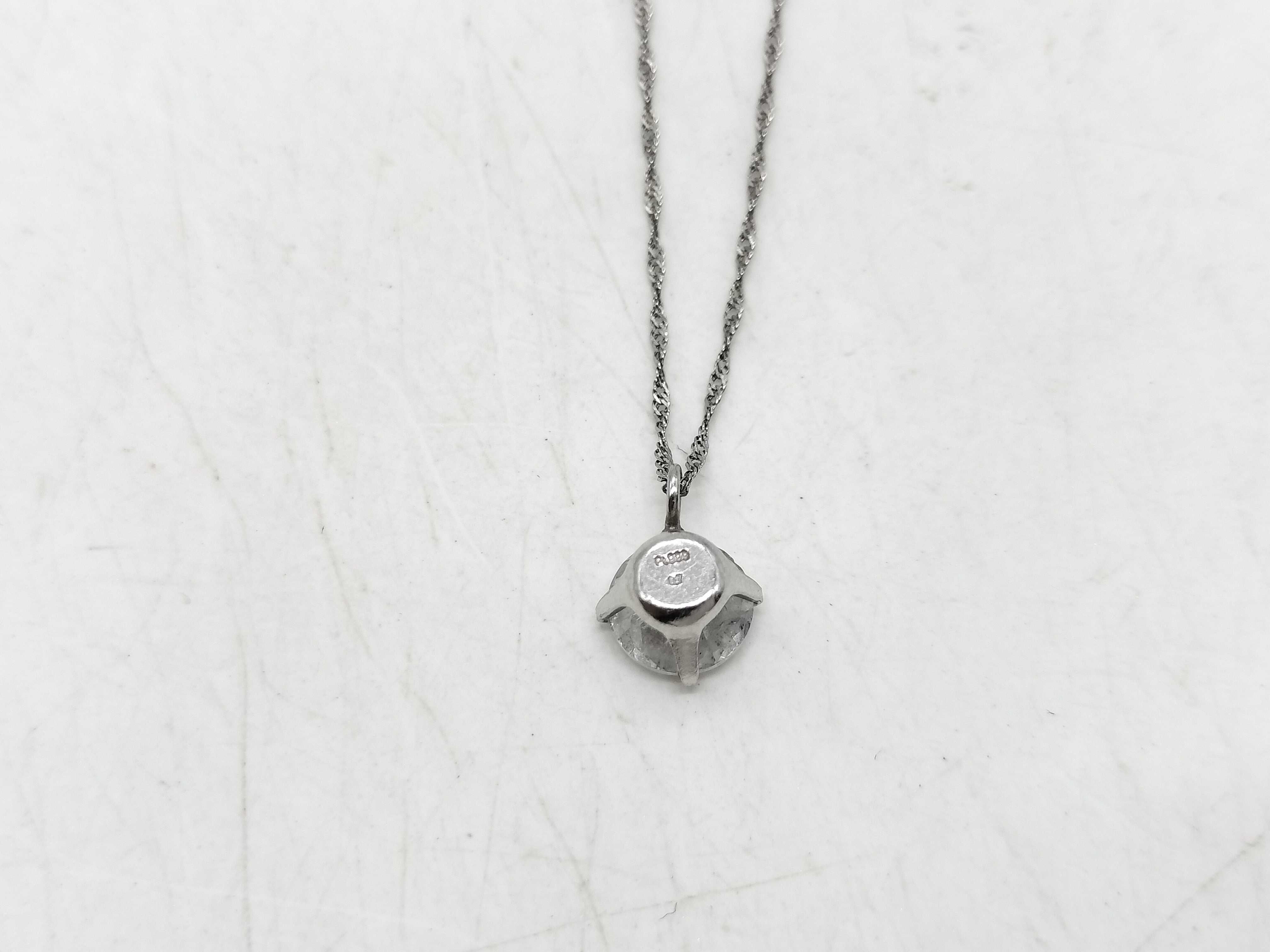 Platinum Solitaire Pendant Necklace with a 0.7 Carat Round Brilliant Cut Diamond