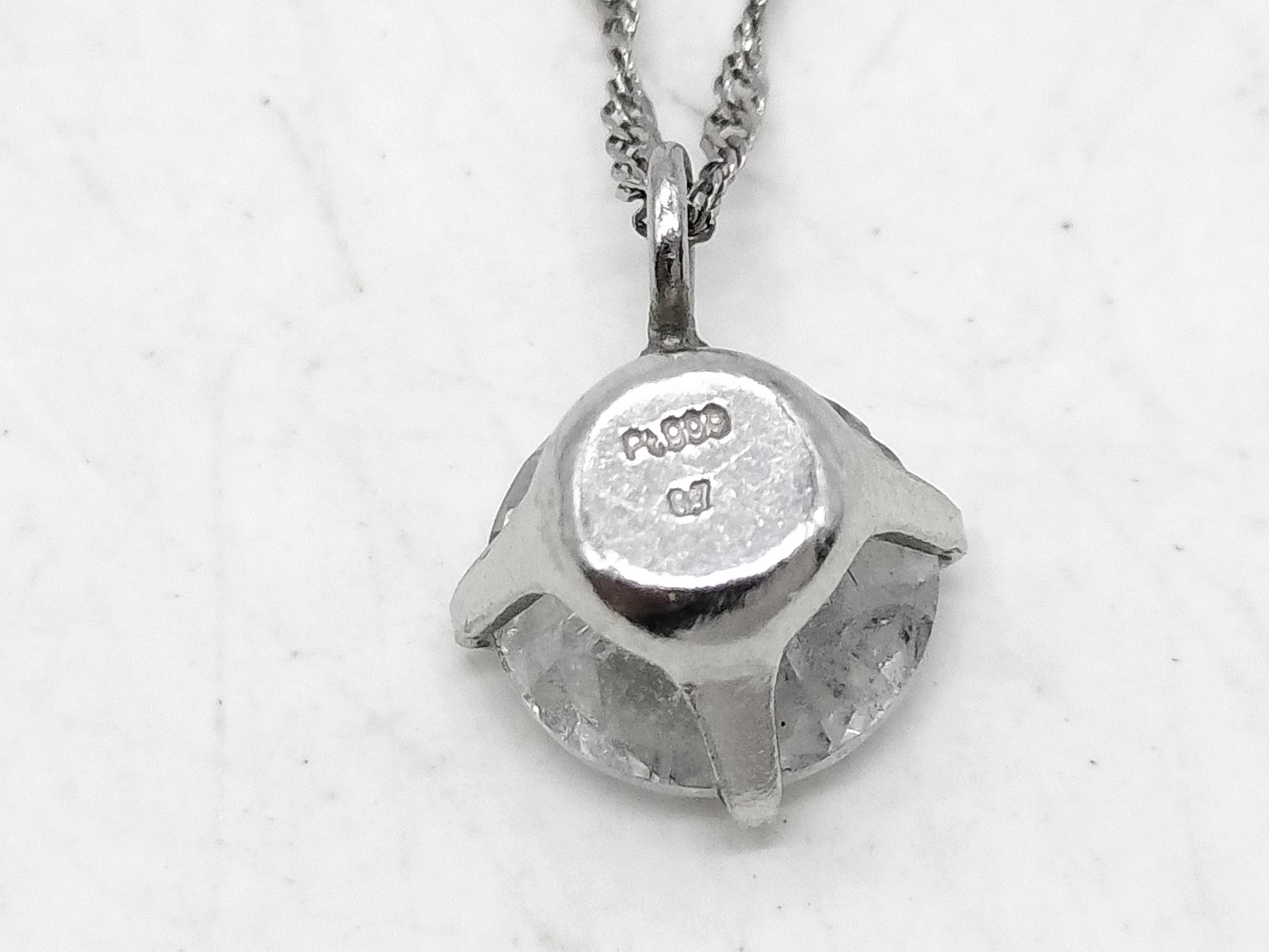 Platinum Solitaire Pendant Necklace with a 0.7 Carat Round Brilliant Cut Diamond