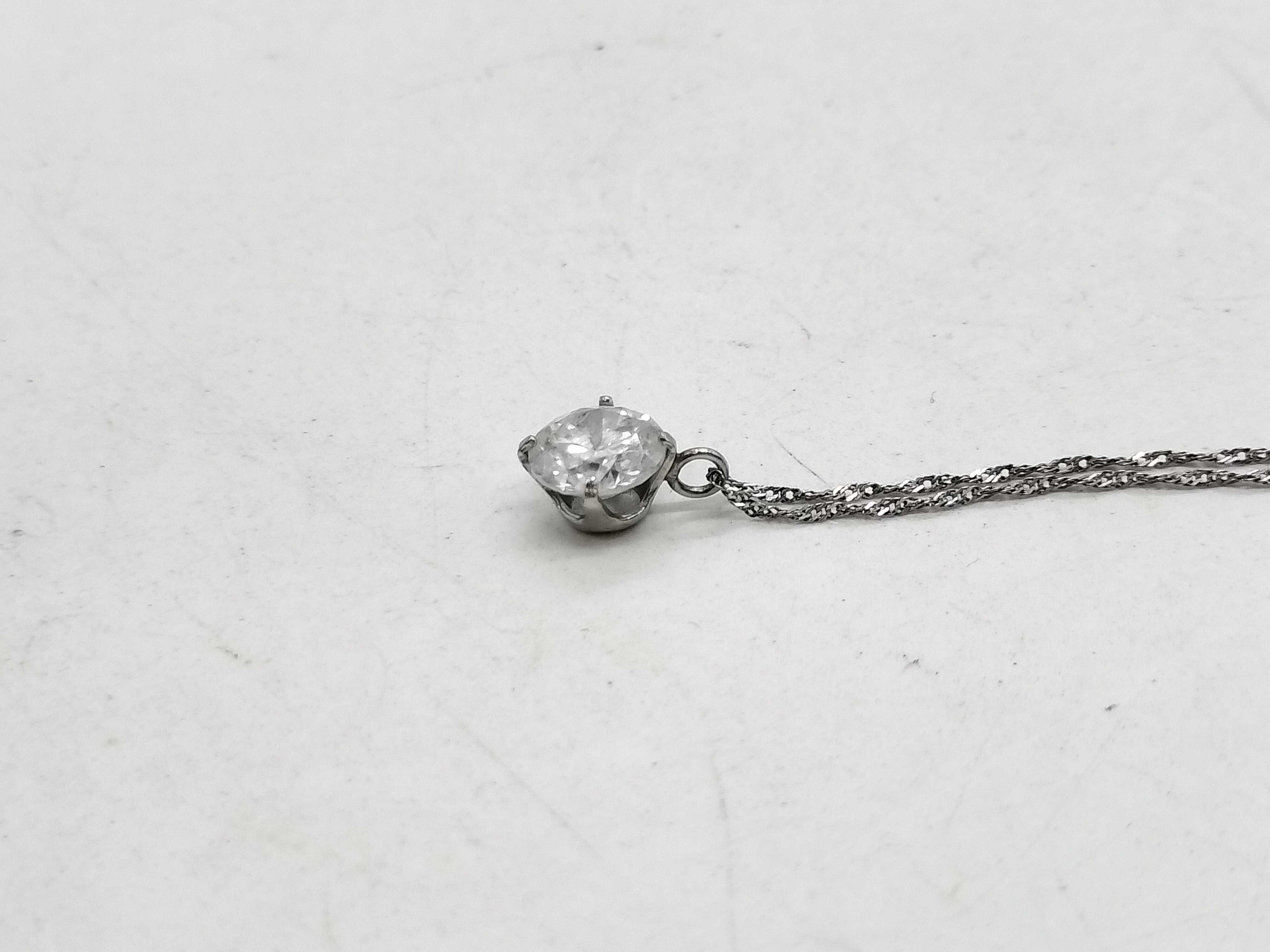 Platinum Solitaire Pendant Necklace with a 0.7 Carat Round Brilliant Cut Diamond
