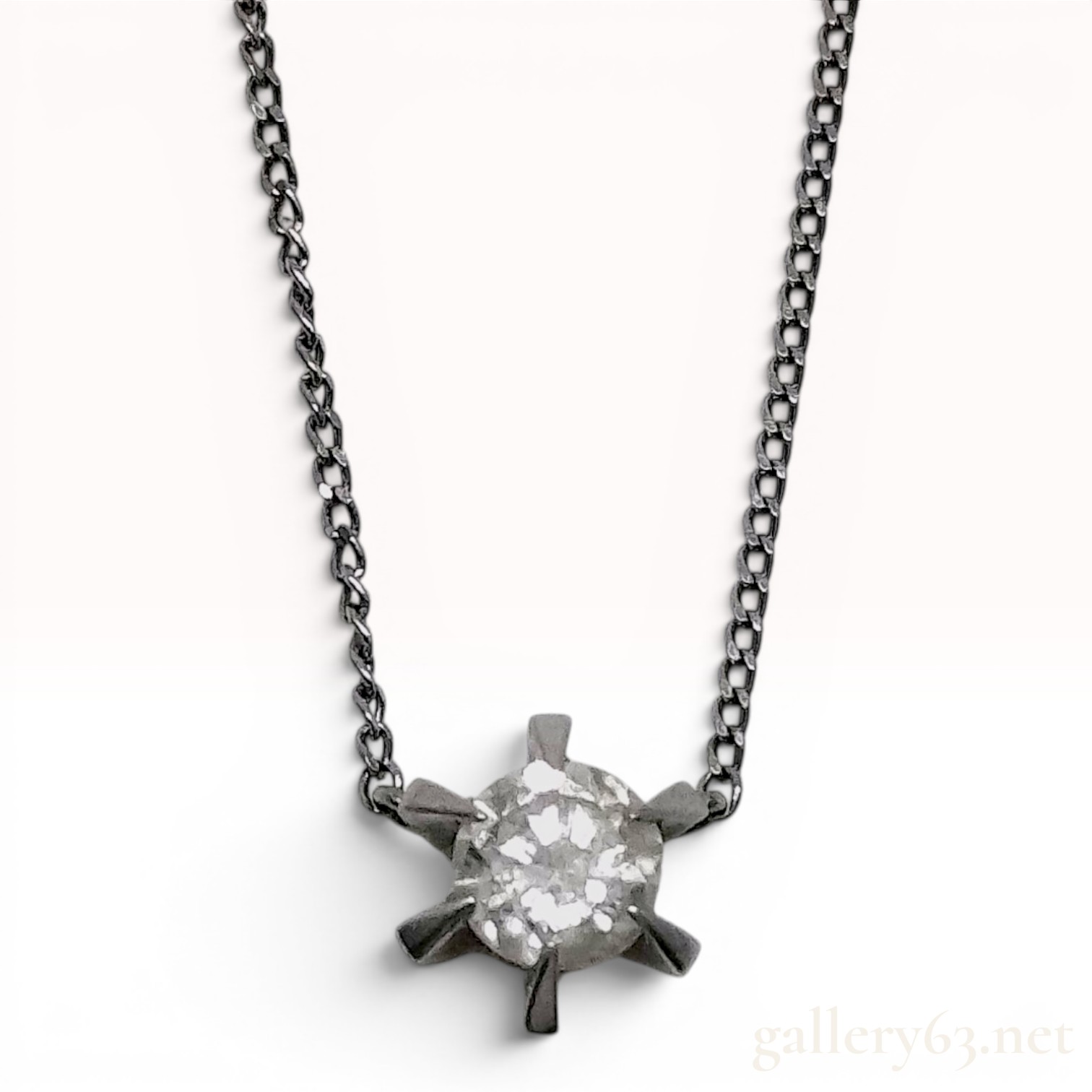 A Platinum and 0.41 Carat Diamond Solitaire Pendant Necklace