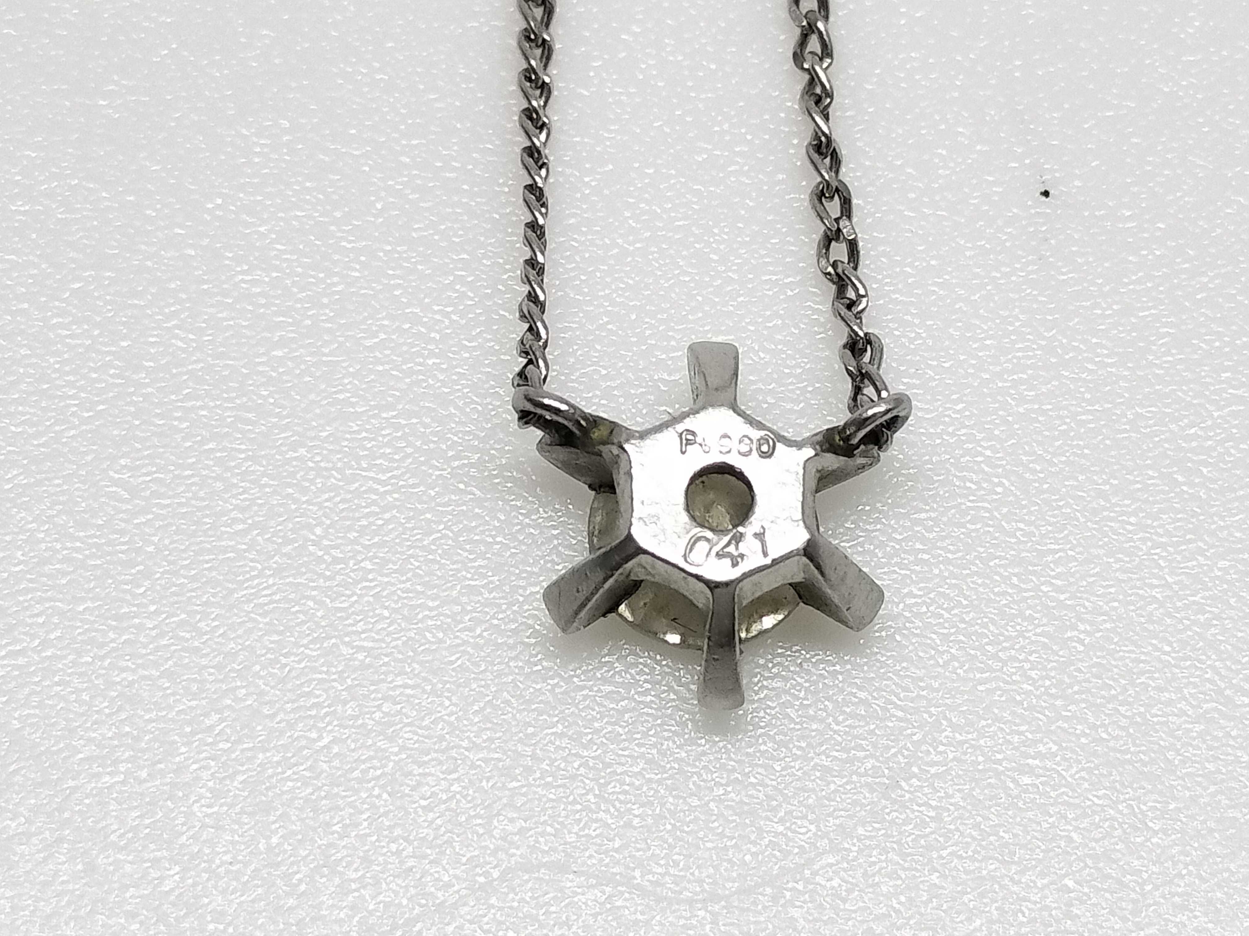 A Platinum and 0.41 Carat Diamond Solitaire Pendant Necklace