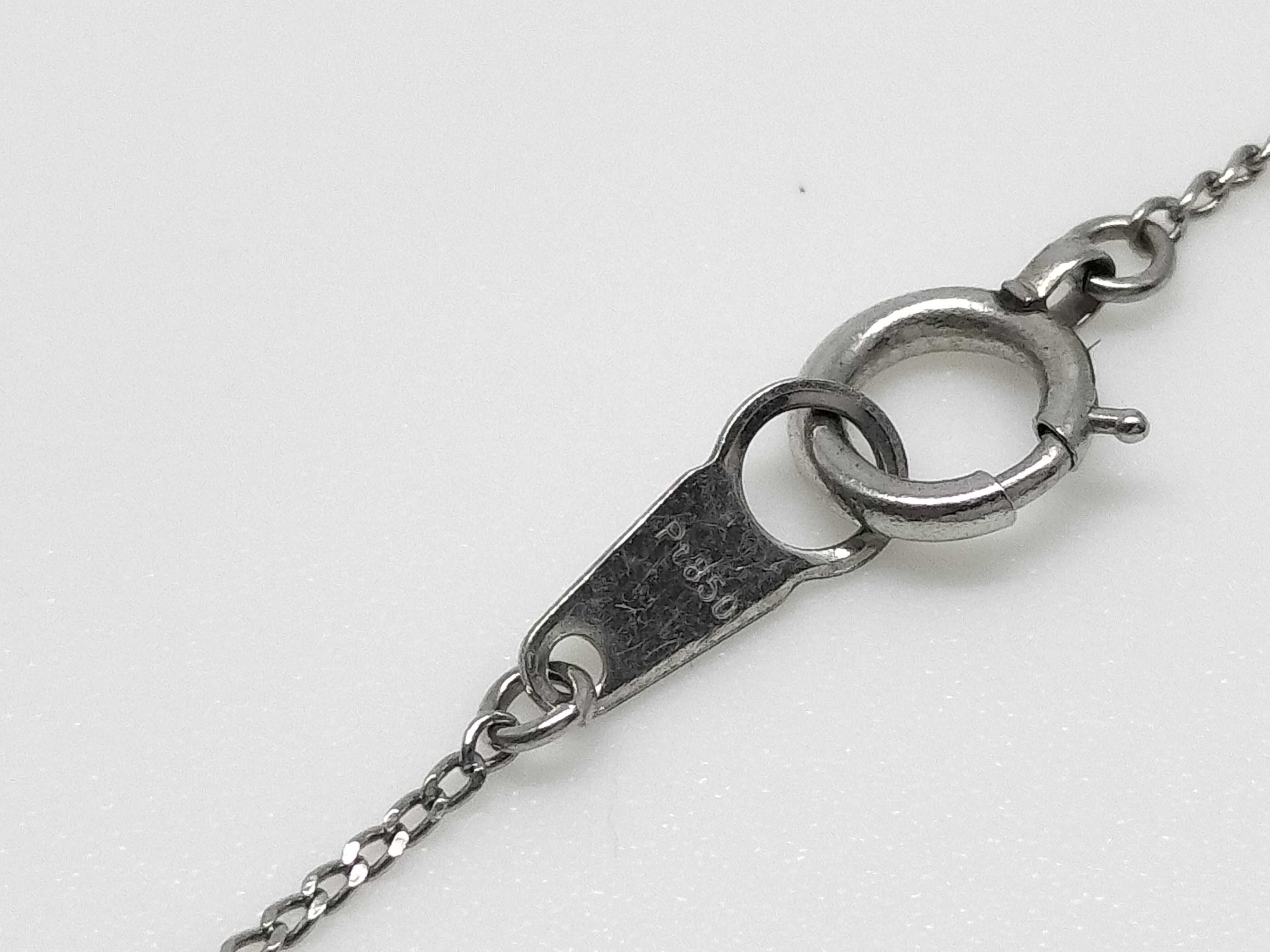 A Platinum and 0.41 Carat Diamond Solitaire Pendant Necklace