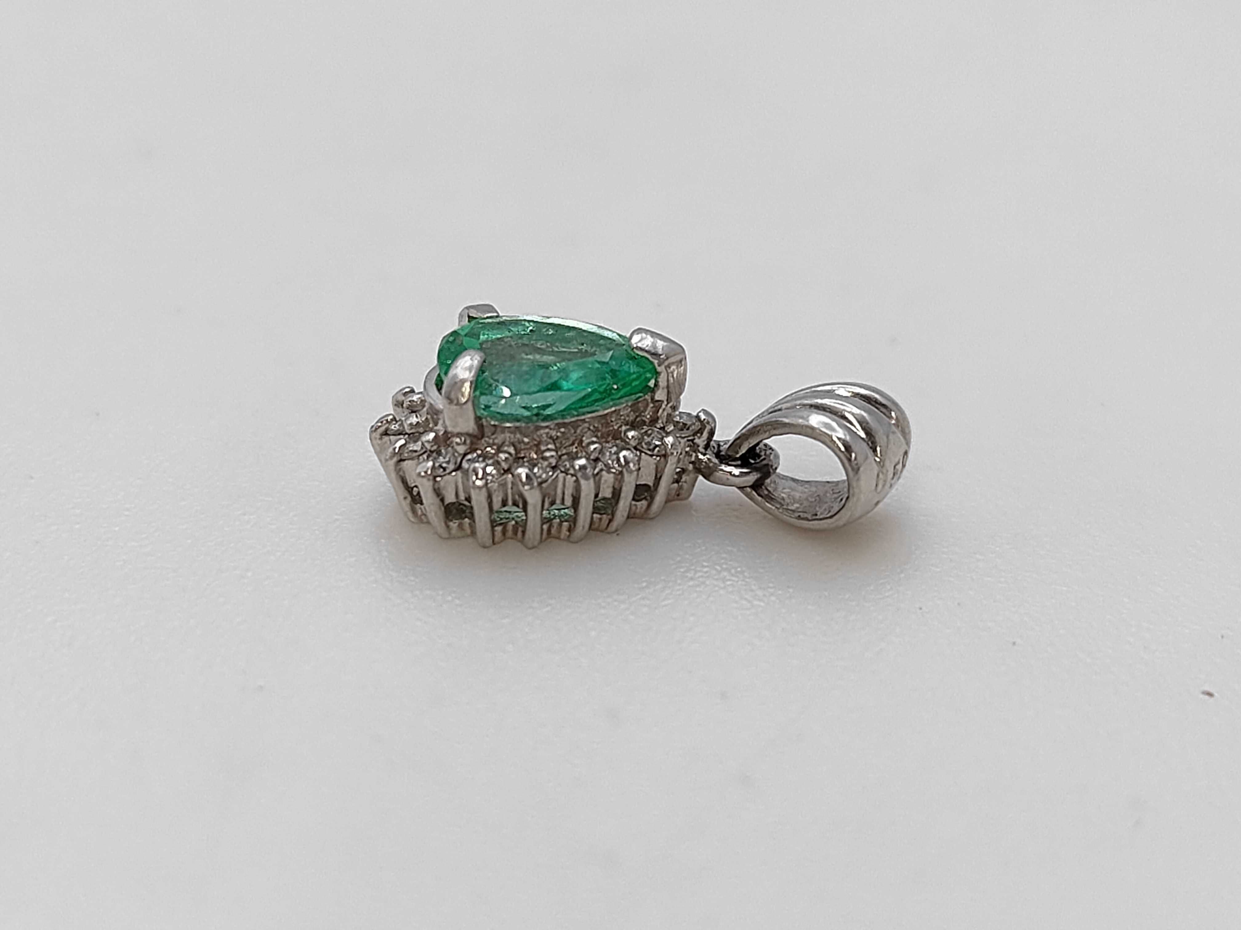 A Platinum Pear-Cut Emerald and Diamond Halo Pendant