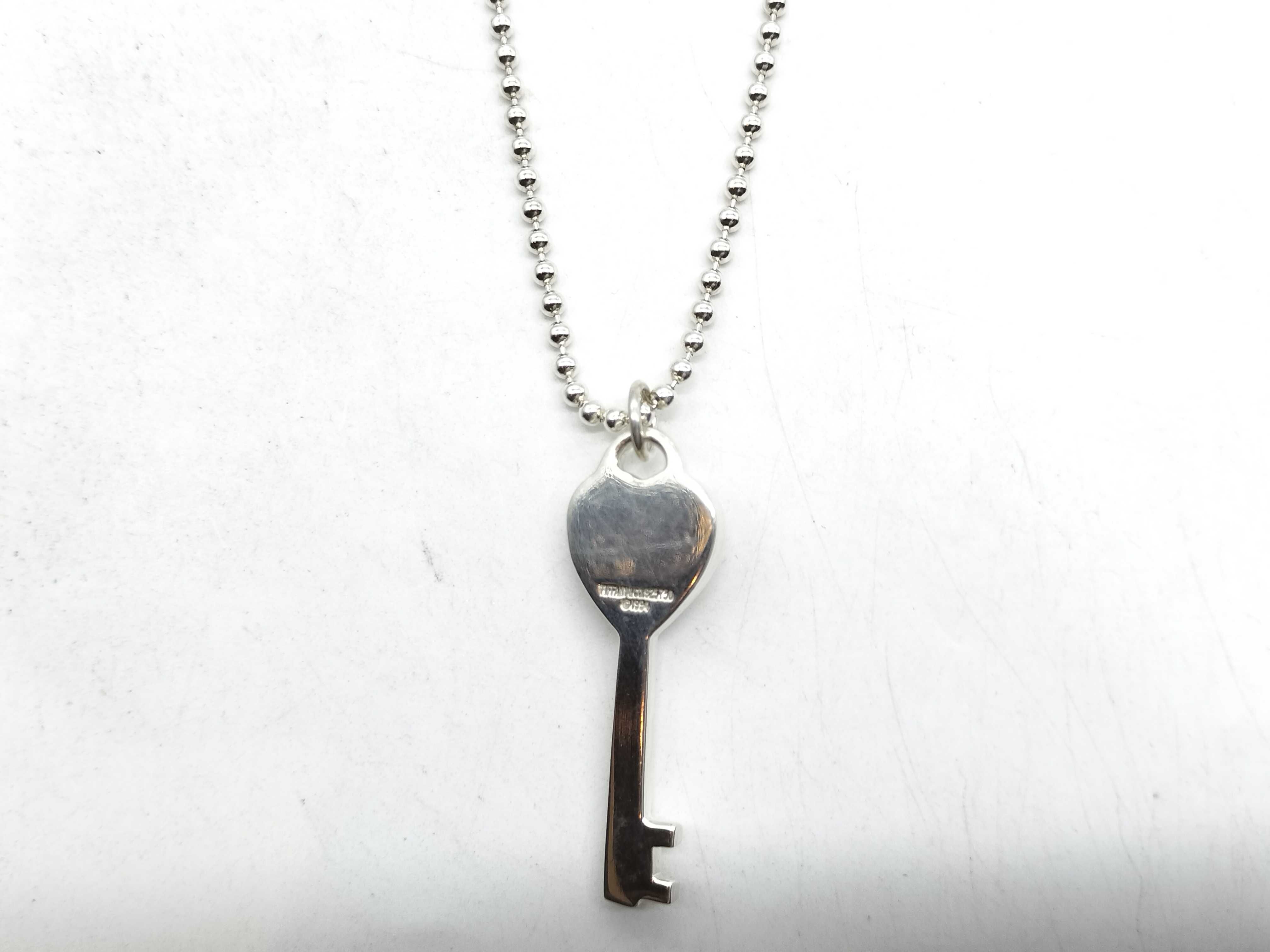 Tiffany & Co. Sterling Silver and 18 Karat Yellow Gold Heart Key Pendant Necklace