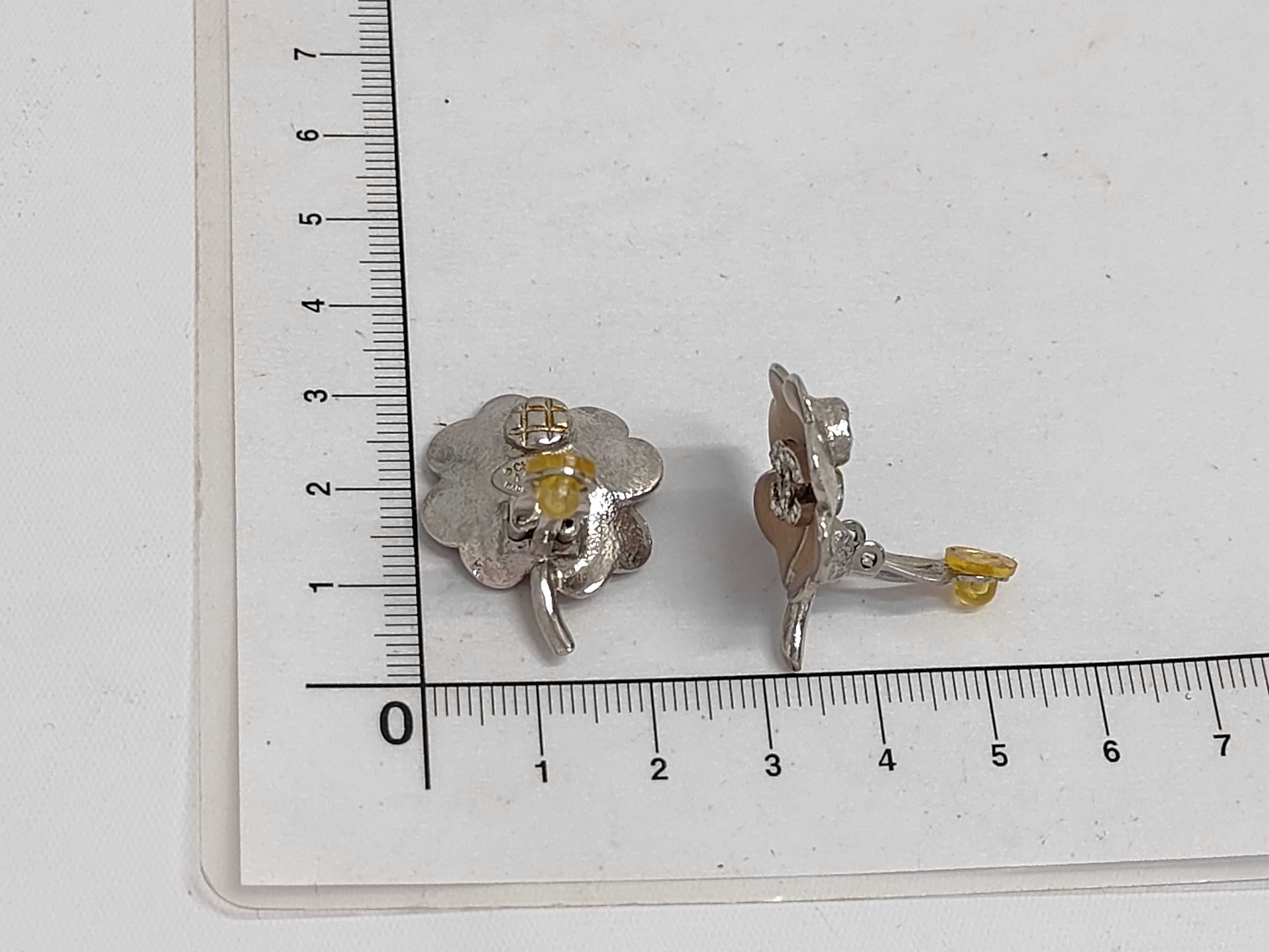 A Pair of Chanel Enamel and Crystal CC Clover Clip-On Earrings