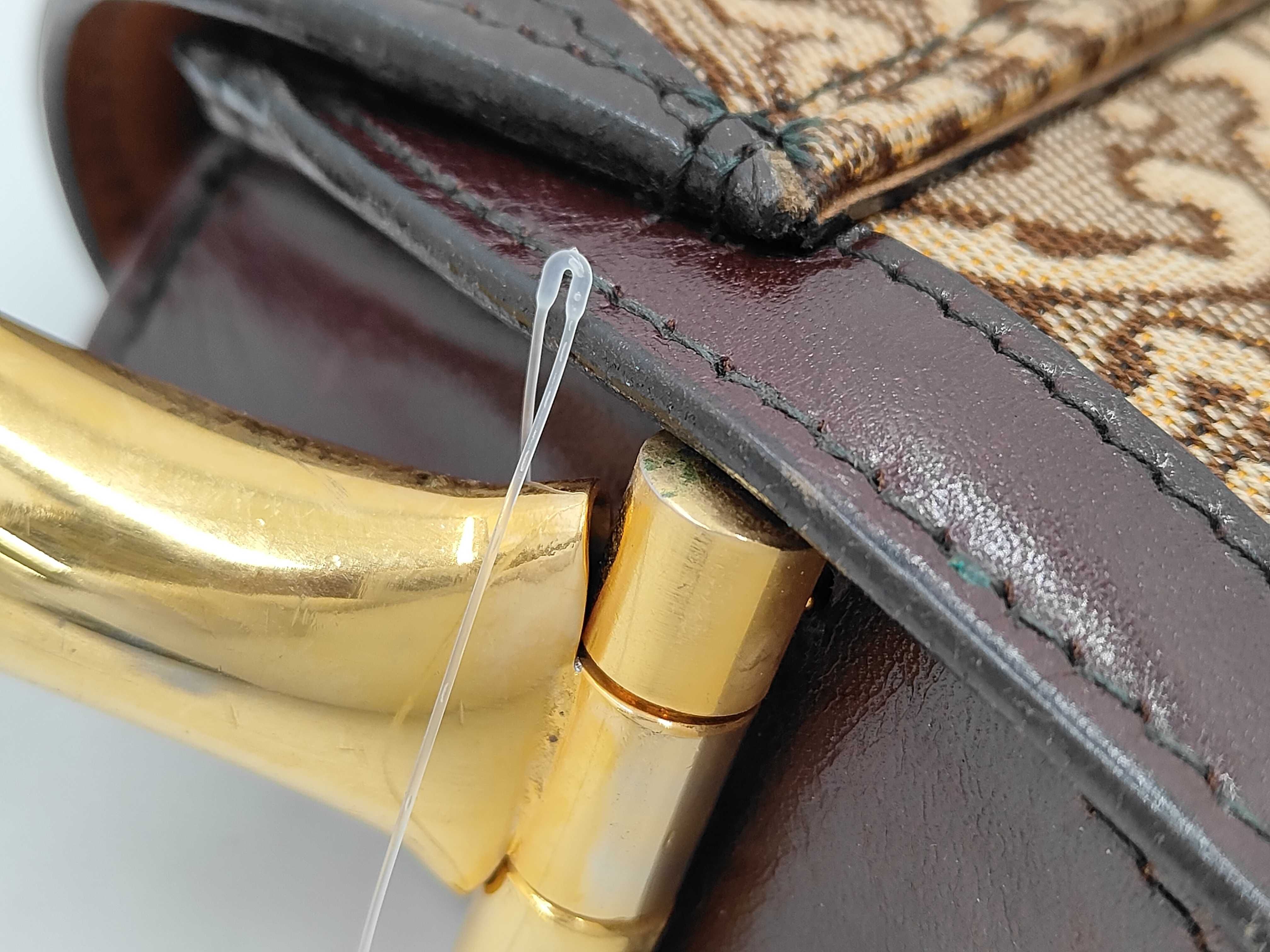 A Vintage Les Must de Cartier Bordeaux Leather and Tapestry Shoulder Bag