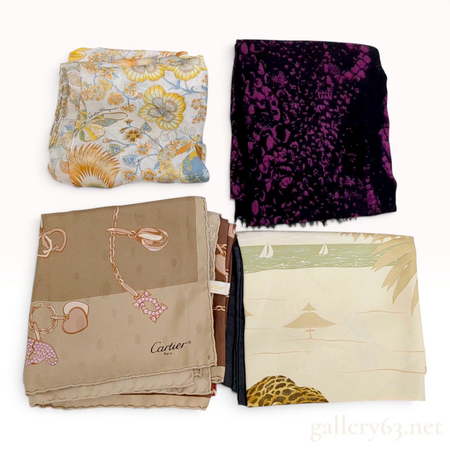 An Assortment of Designer Scarves including Cartier and Salvatore Ferragamo