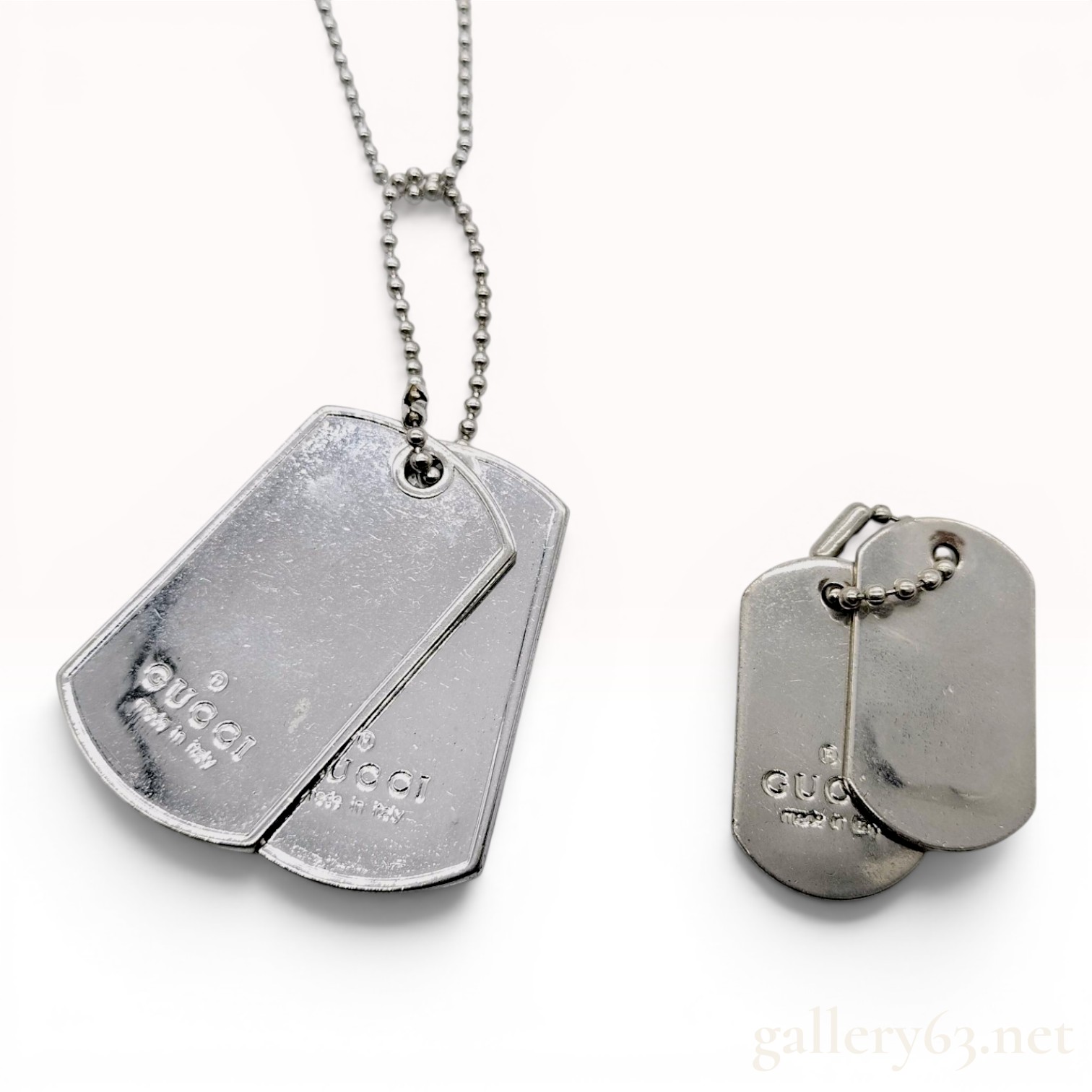 A Group of Gucci Sterling Silver Dog Tag Jewelry