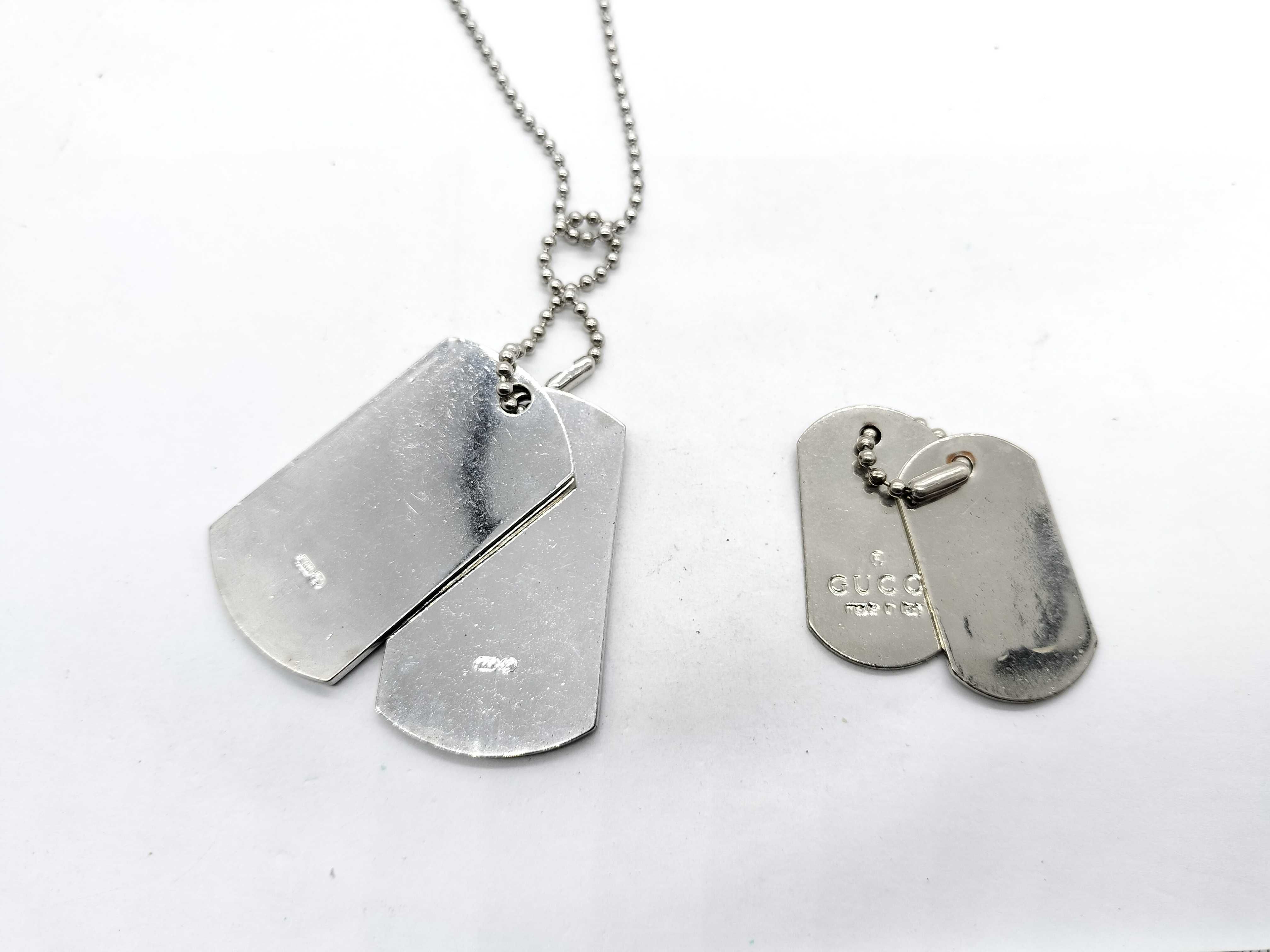A Group of Gucci Sterling Silver Dog Tag Jewelry