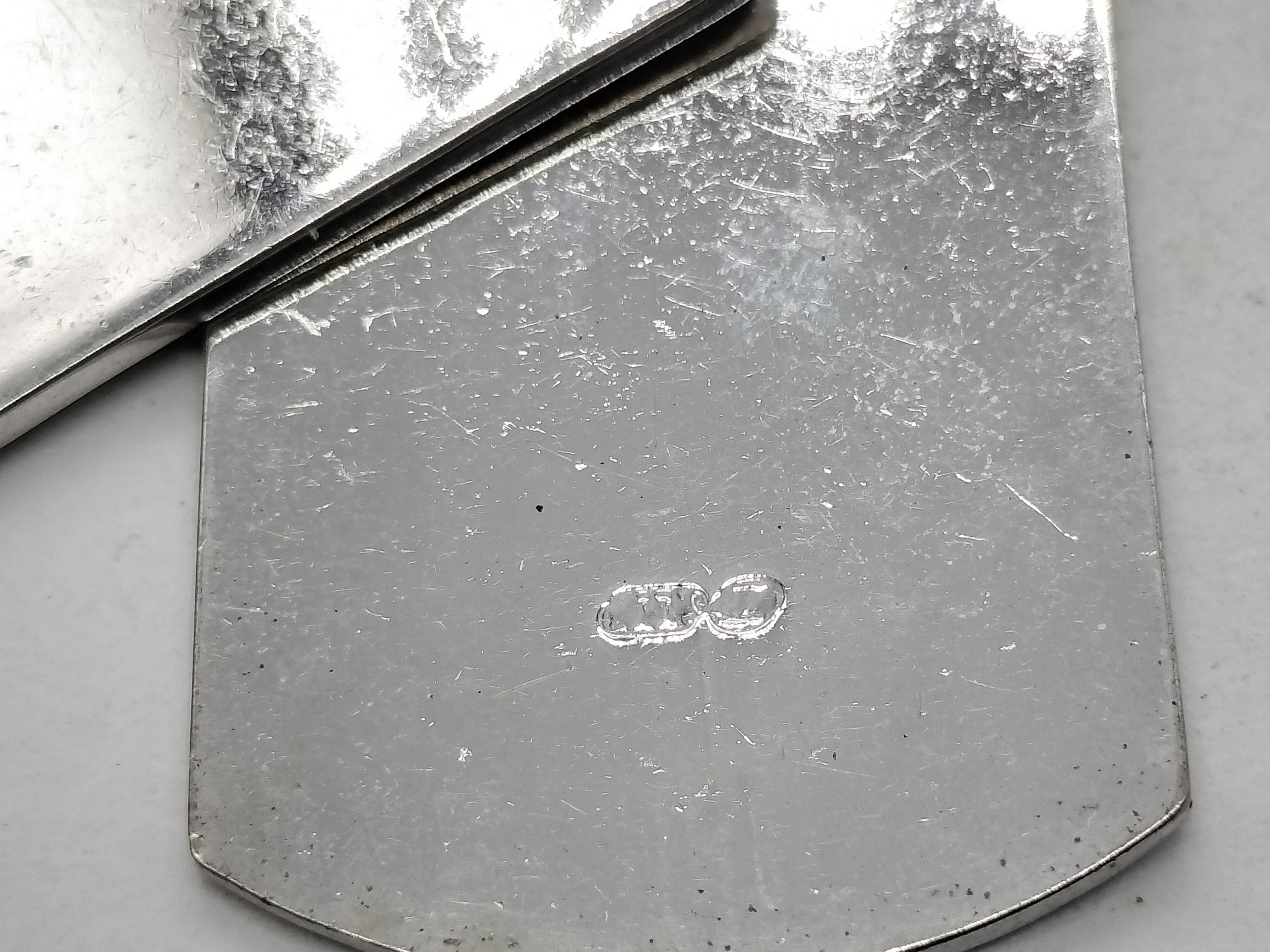 A Group of Gucci Sterling Silver Dog Tag Jewelry