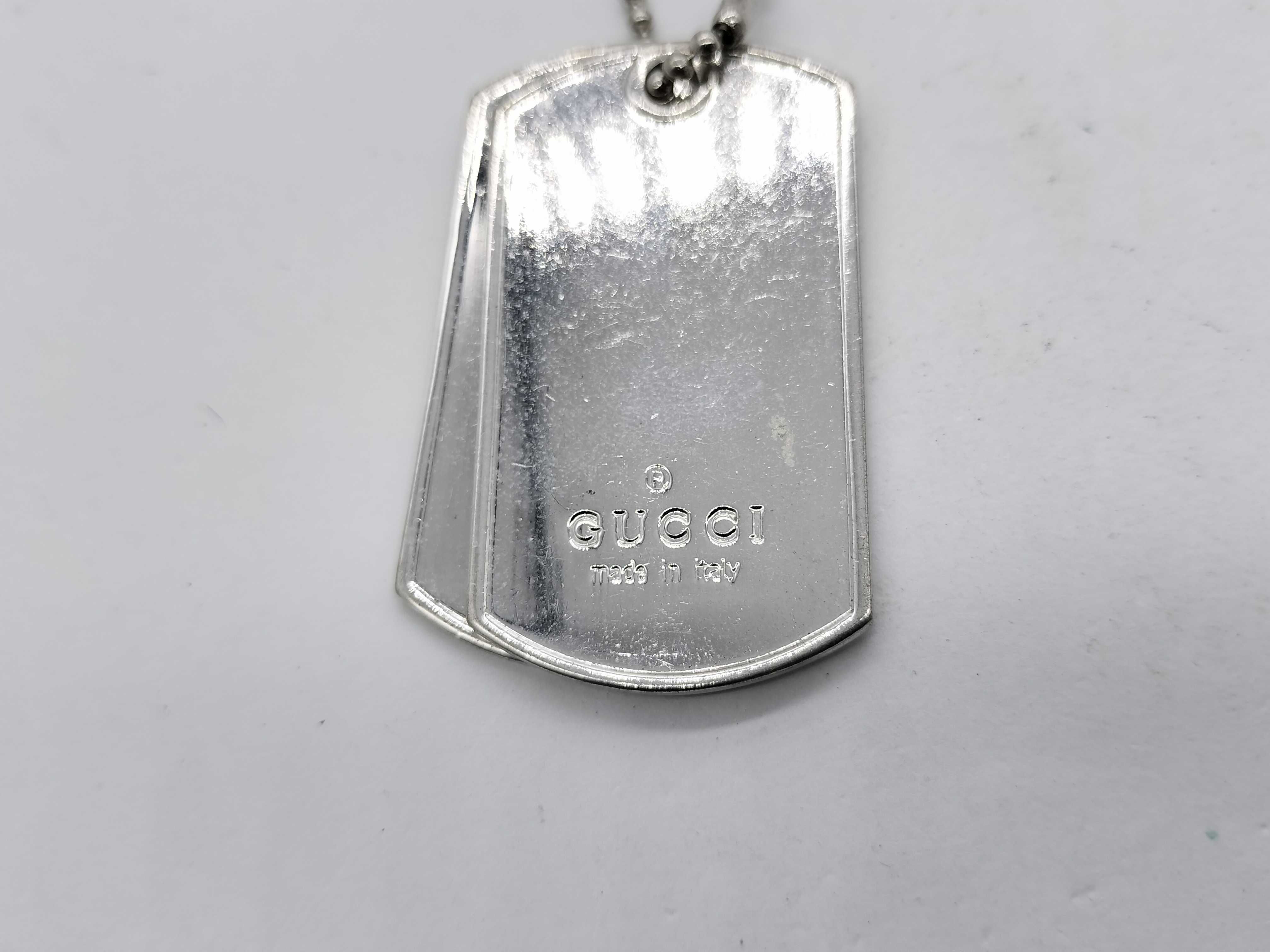 A Group of Gucci Sterling Silver Dog Tag Jewelry