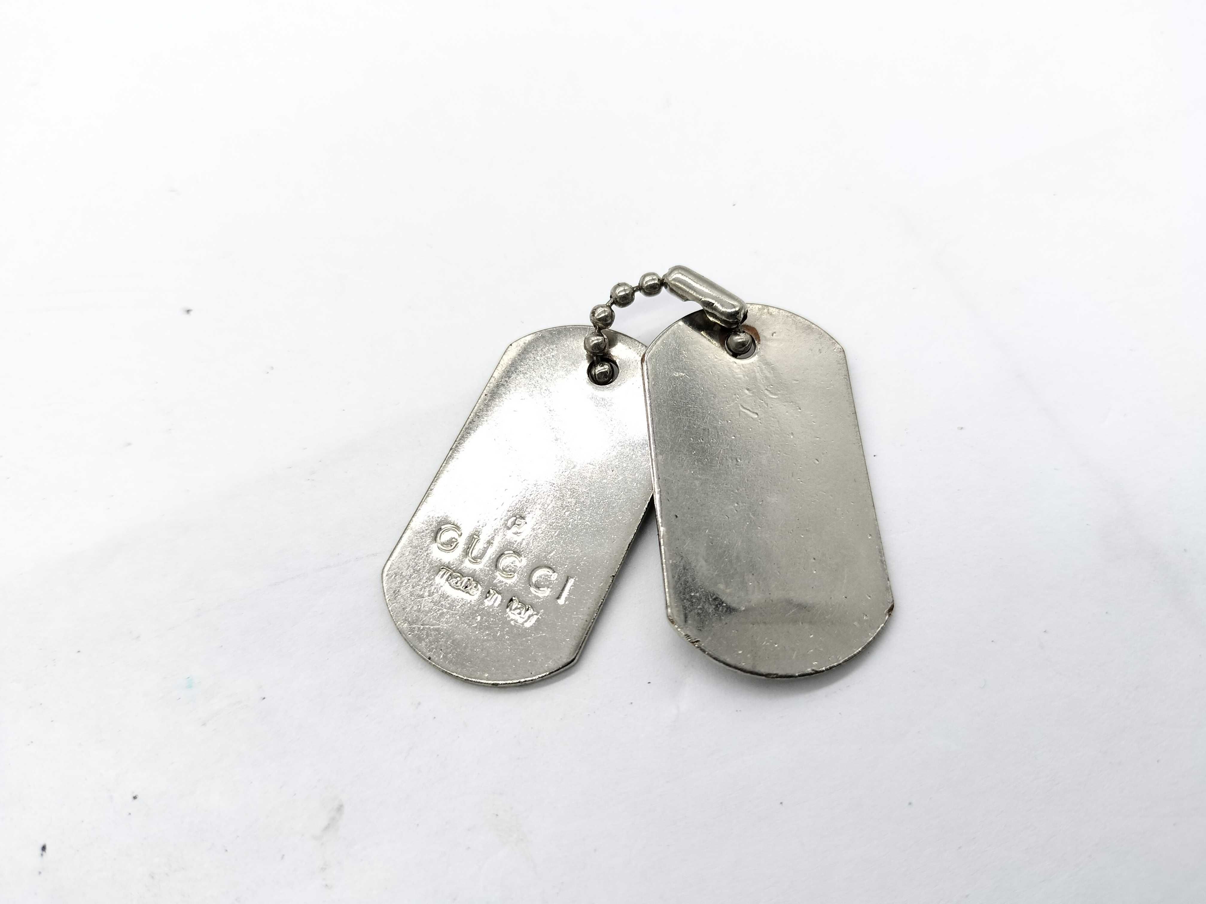 A Group of Gucci Sterling Silver Dog Tag Jewelry
