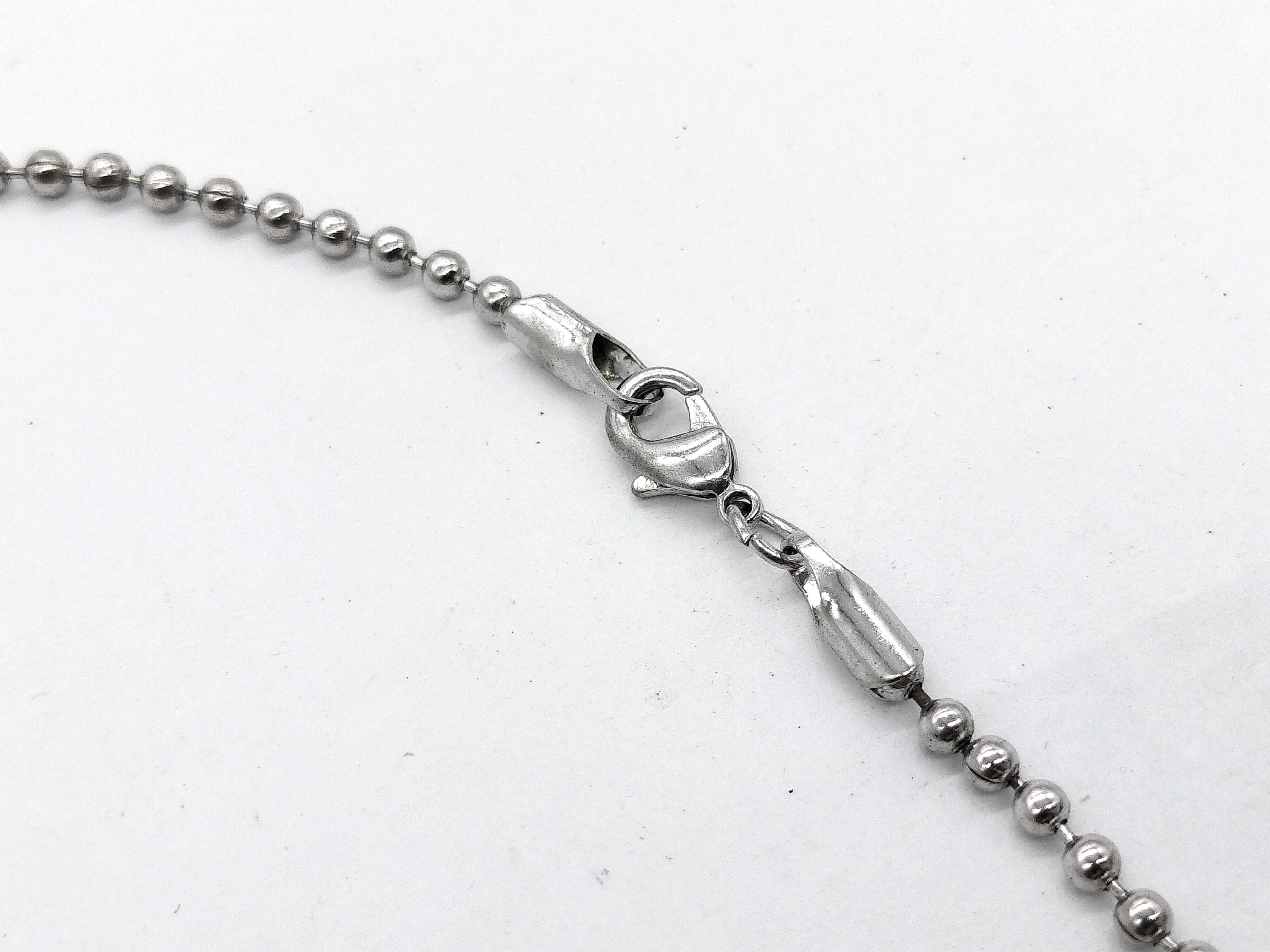 A Group of Gucci Sterling Silver Dog Tag Jewelry