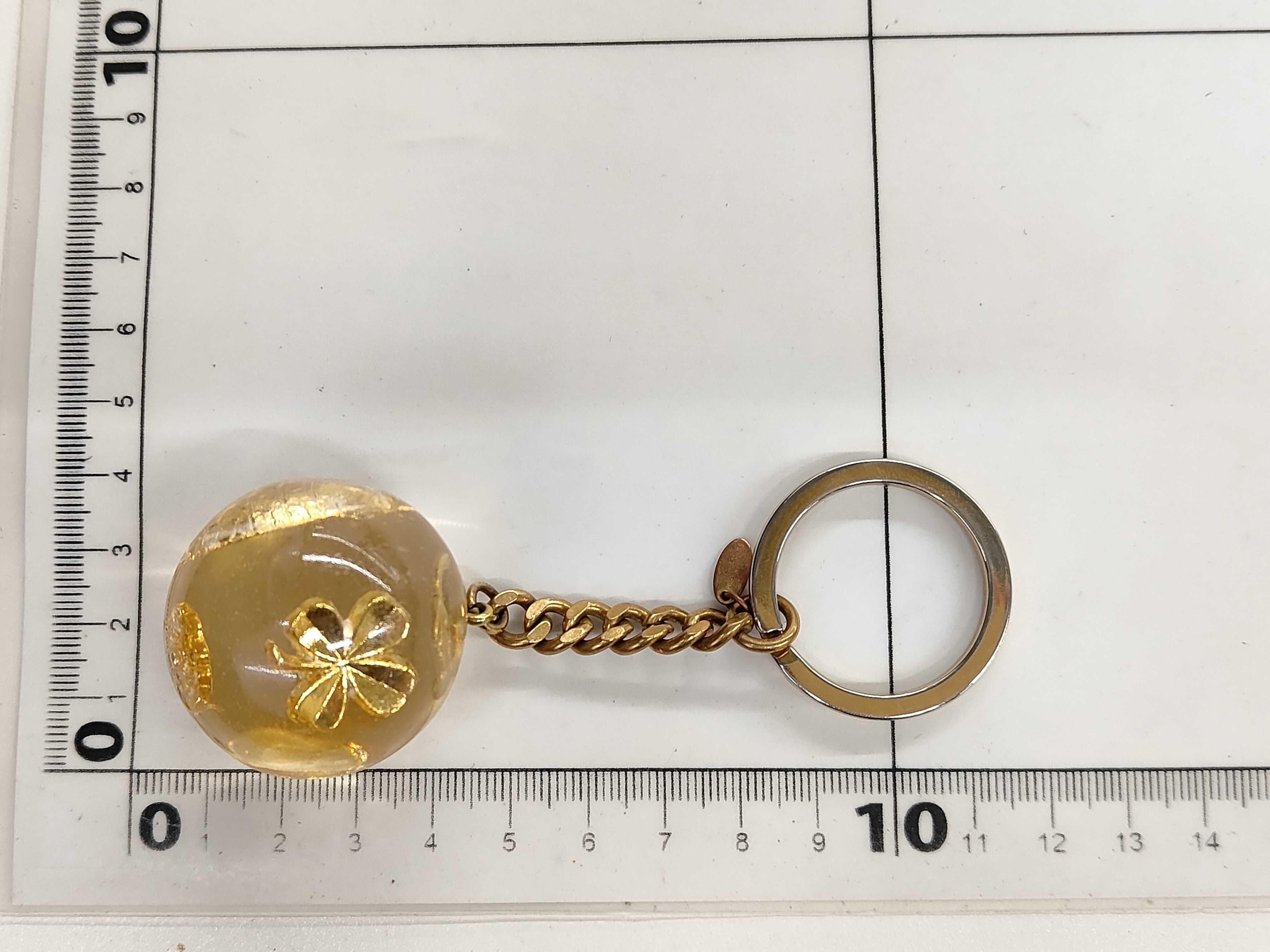 A Chanel Gold-Tone and Resin Lucky Clover Keychain, 1997