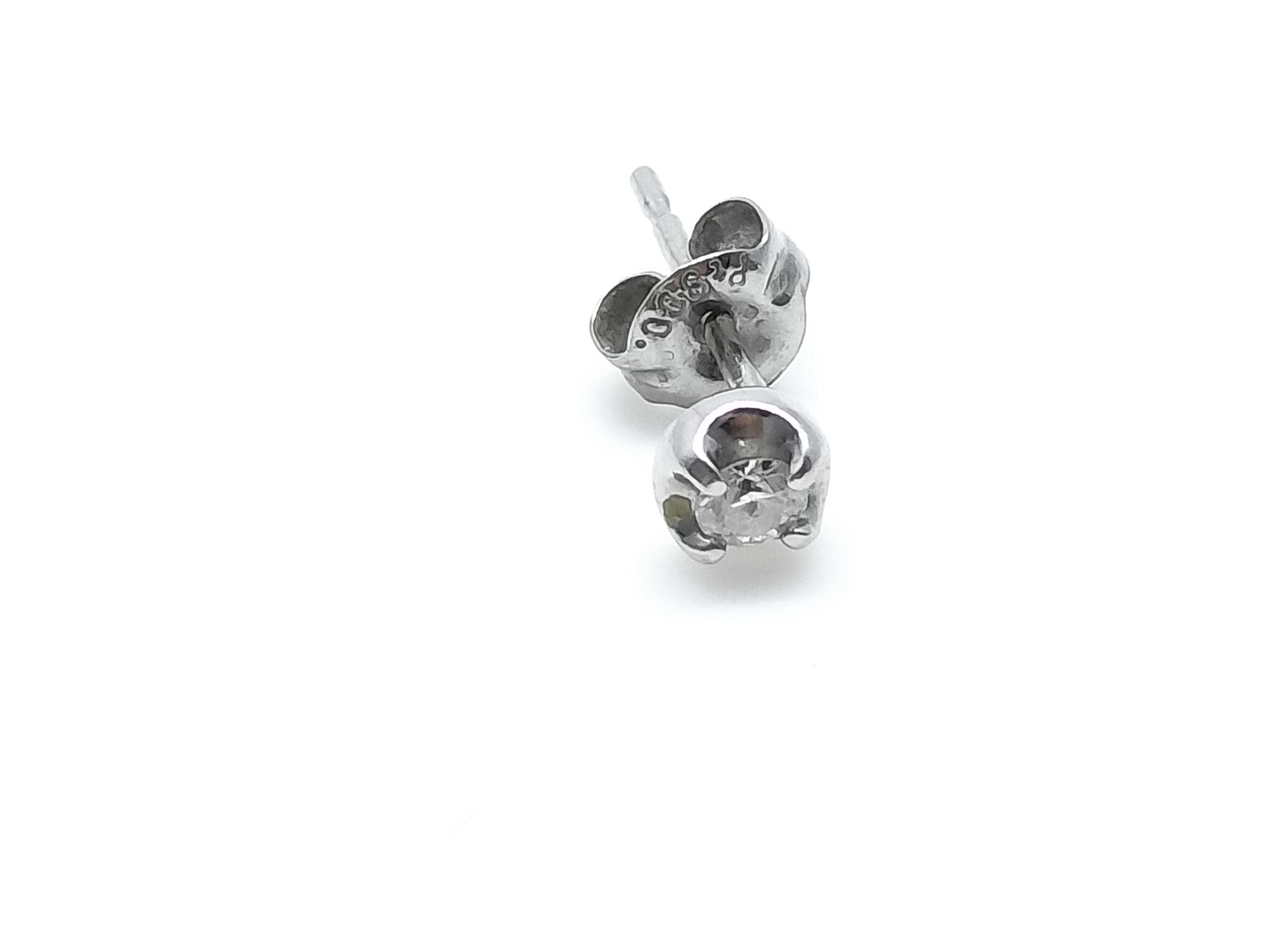 A Pair of Platinum and Round-Cut Diamond Stud Earrings