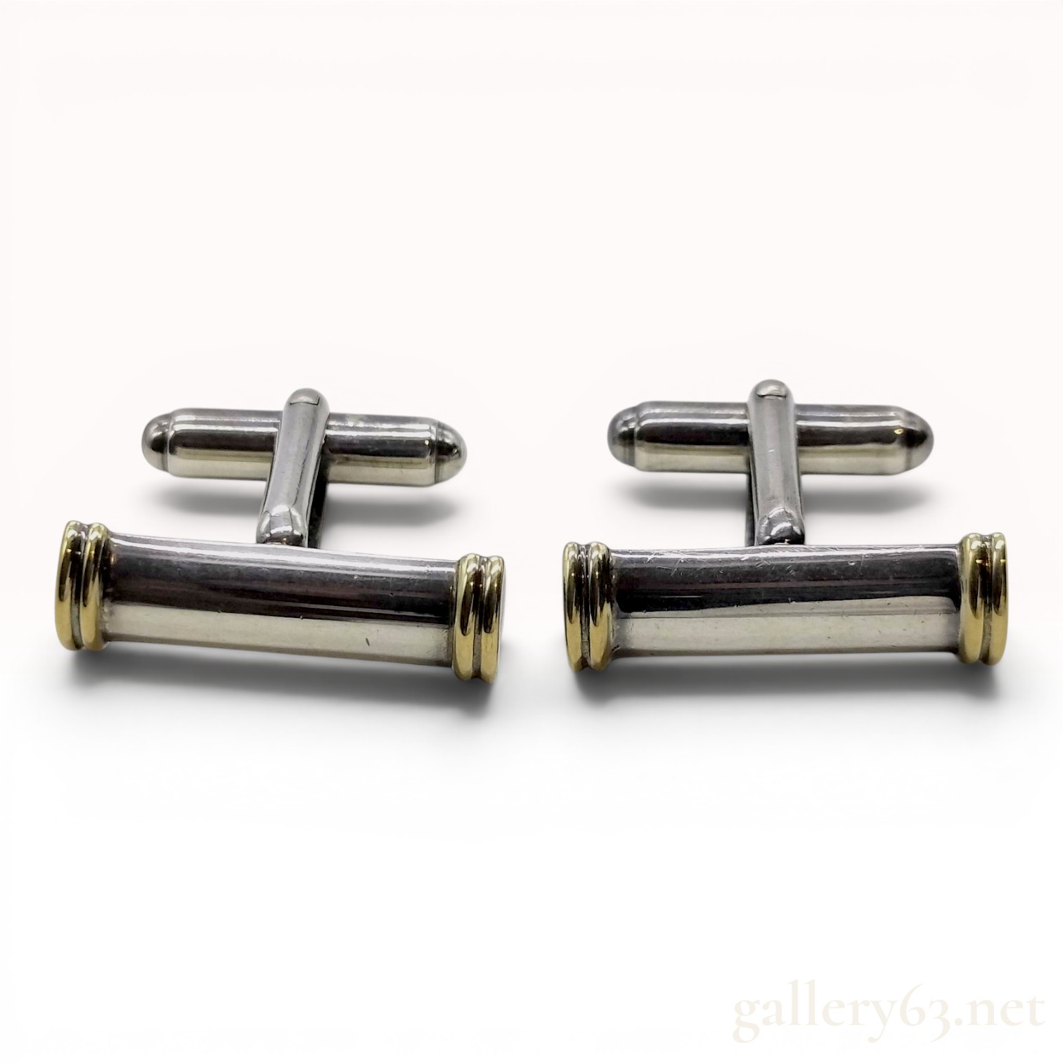 A Pair of Tiffany & Co. Sterling Silver and 18K Yellow Gold Baton Cufflinks