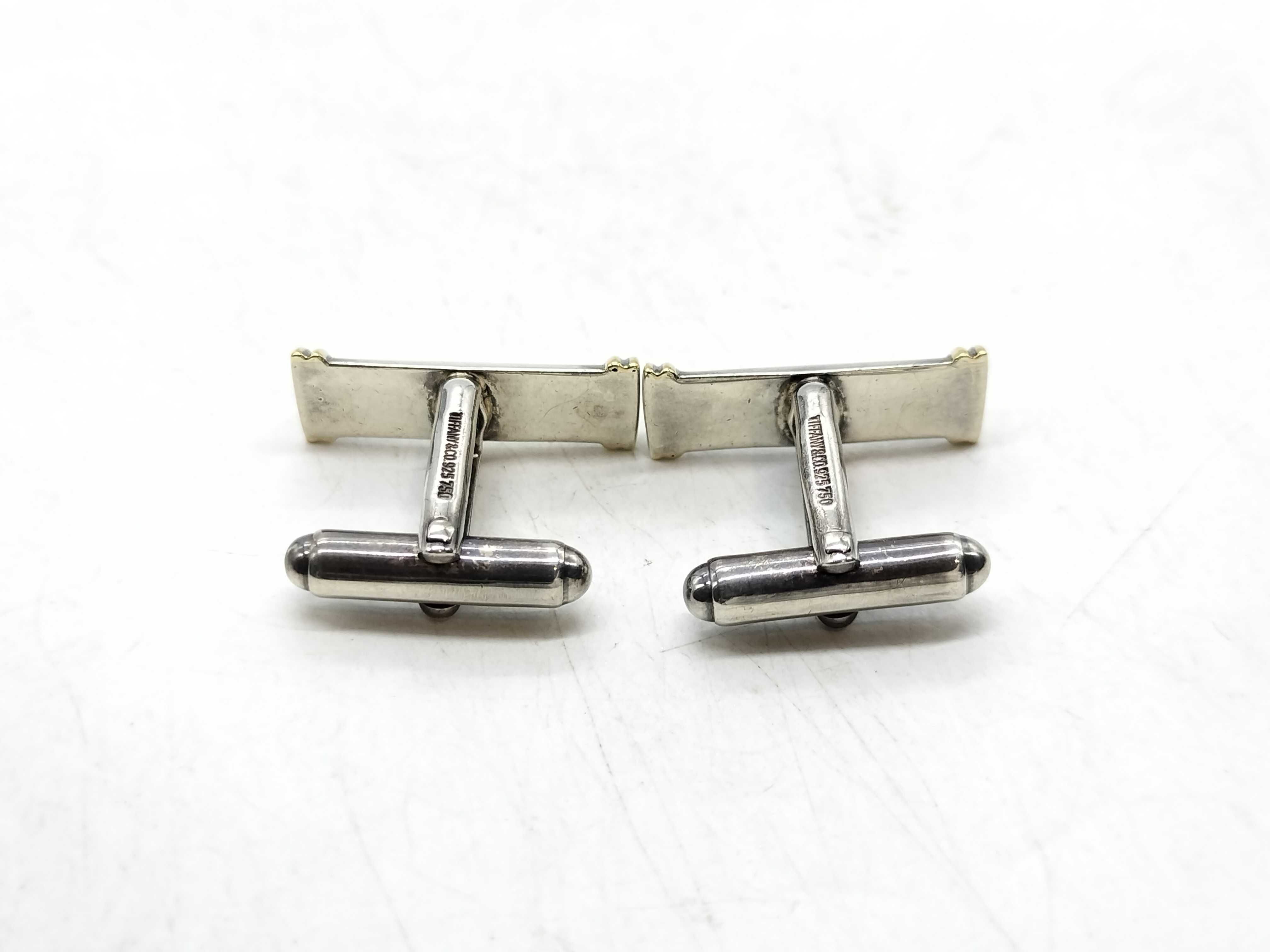 A Pair of Tiffany & Co. Sterling Silver and 18K Yellow Gold Baton Cufflinks
