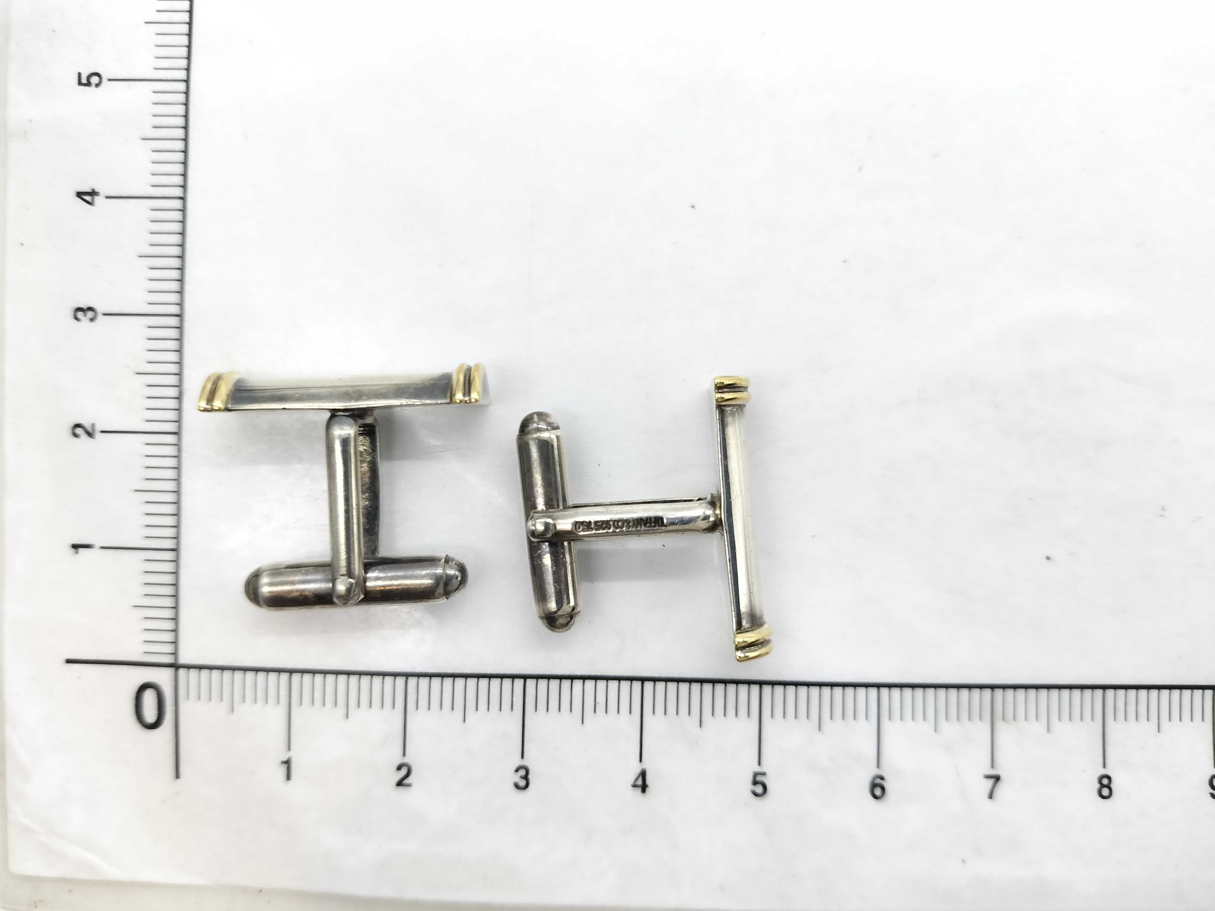 A Pair of Tiffany & Co. Sterling Silver and 18K Yellow Gold Baton Cufflinks