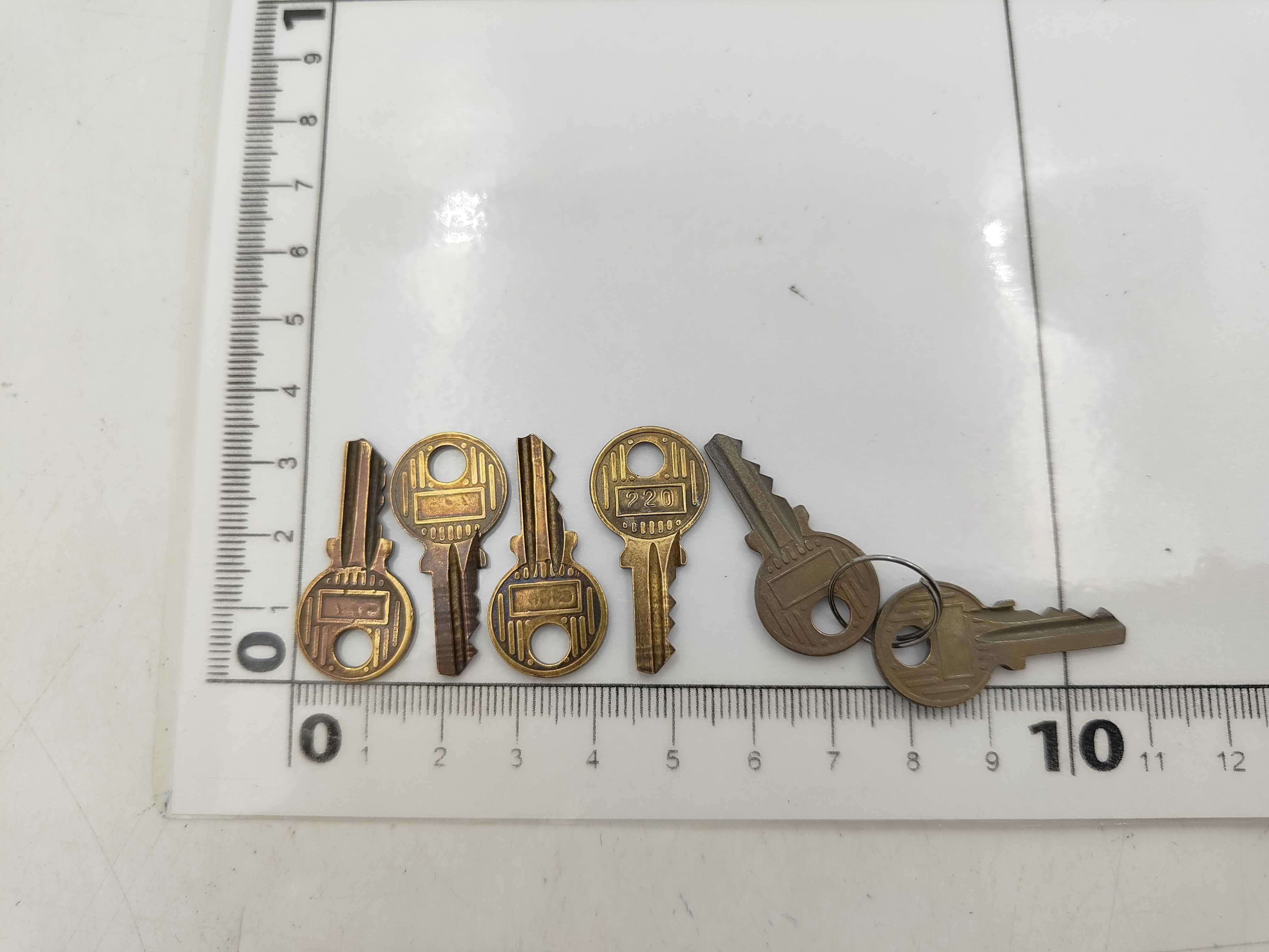 A Collection of Vintage Gold-Tone Hermes Keys