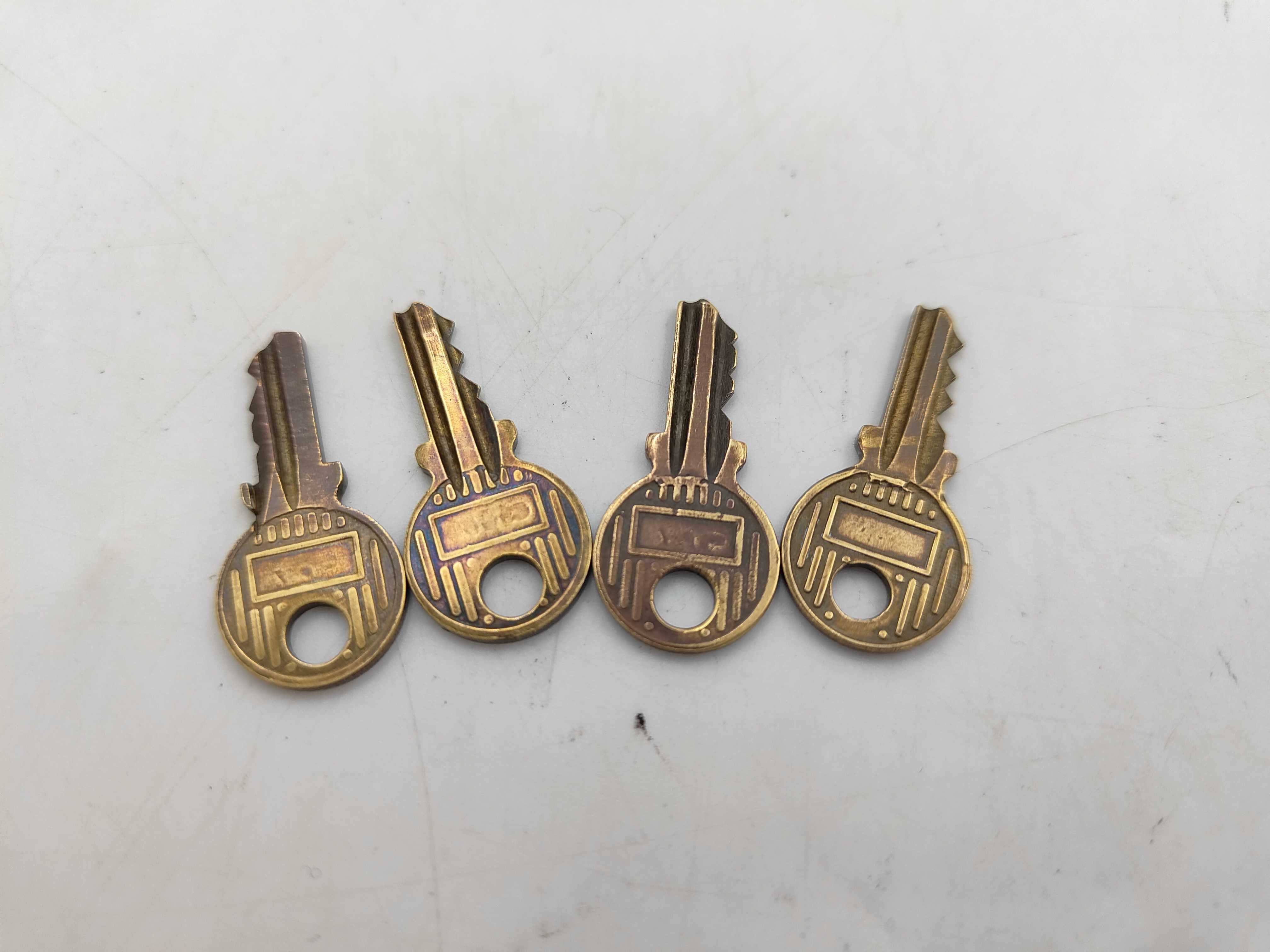 A Collection of Vintage Gold-Tone Hermes Keys