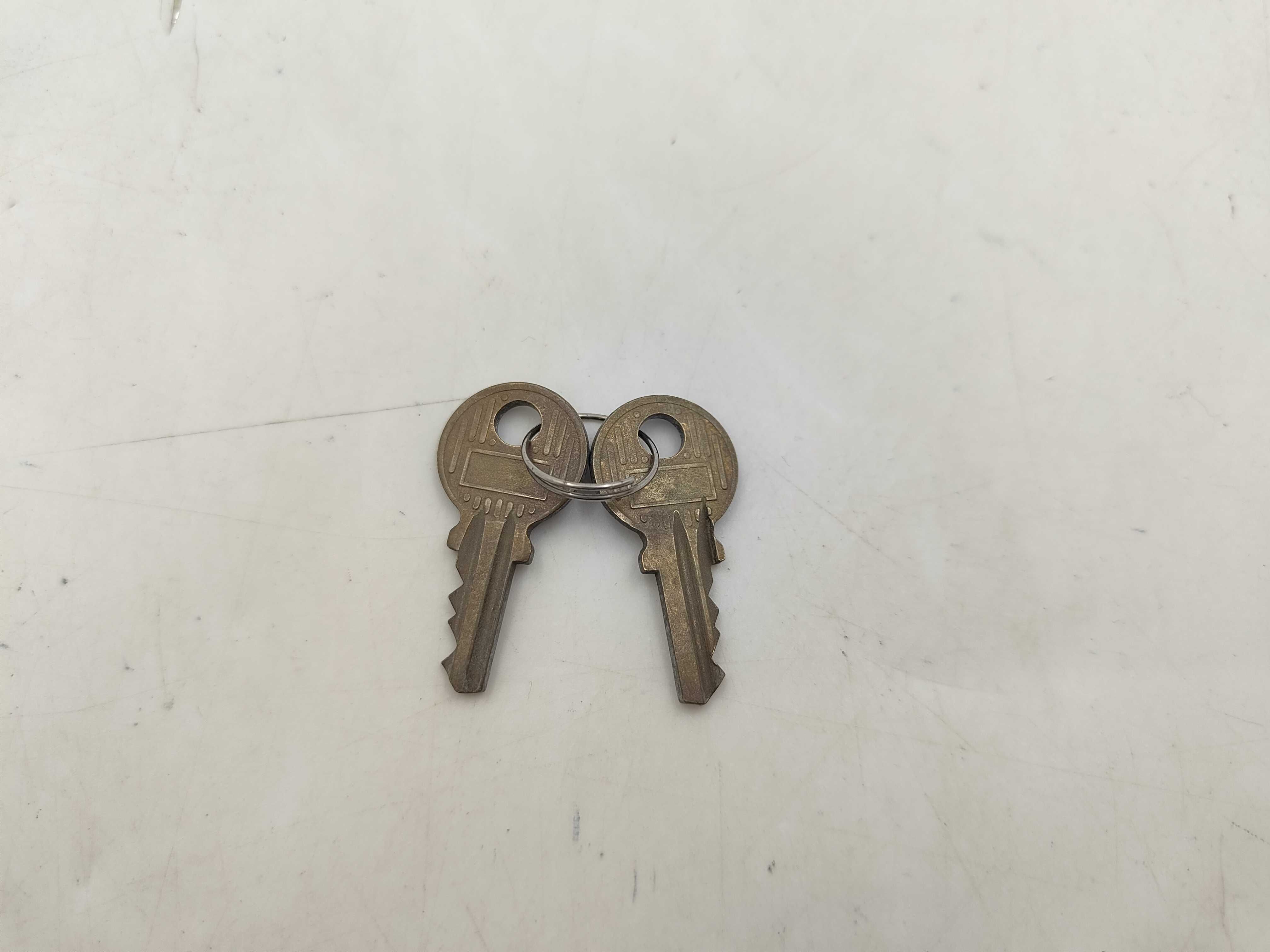 A Collection of Vintage Gold-Tone Hermes Keys