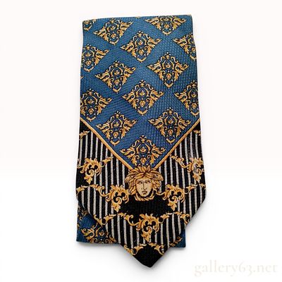 Gianni Versace Silk Medusa and Baroque Pattern Necktie. A 100 percent silk necktie by Gianni 